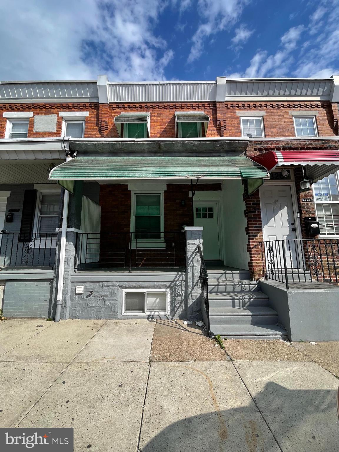 Located in the Elmwood Park section, this front porch rowhome features 3 bedrooms and 1.5 baths. The home has been fully renovated and includes a finished basement and a large backyard. Move-in ready.