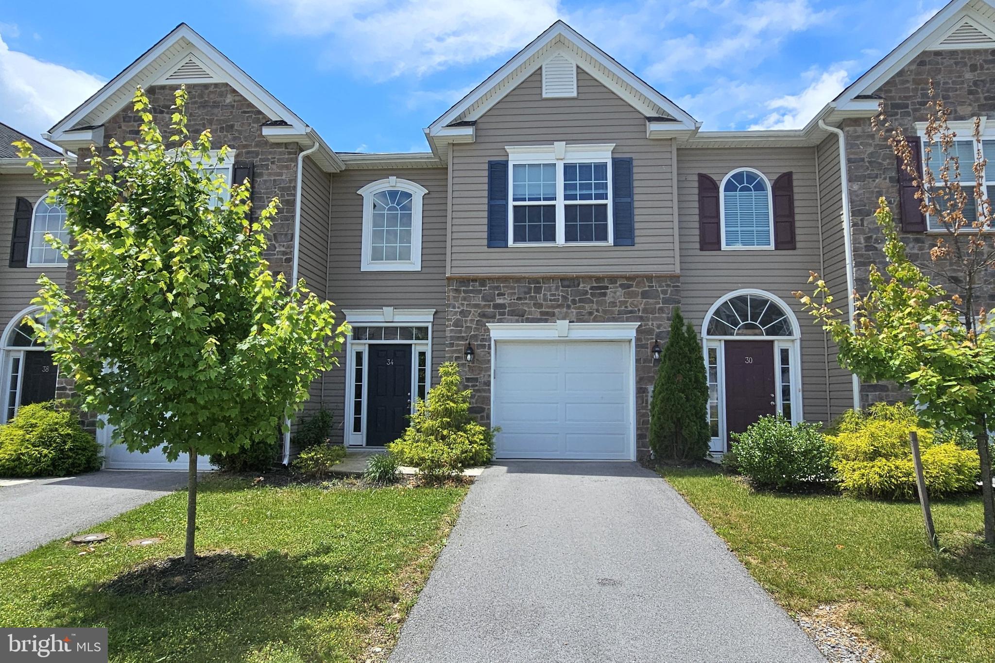Great location, three bedroom, townhouse with garage in the amenity-rich Spring Mills subdivision. The home offers a beautiful open floor plan with upgraded kitchen featuring maple cabinets and granite counter top with low maintenance LVP stretching throughout the first floor.  The modern kitchen design features stainless steel appliances, a counter-height bar, and a large pantry.  The adjoining space includes an open area for dining that overlooks the family room and gathering space with a large window and glass doorway to the enclosed back yard, creating a nice and bright entertaining area.  The two-story foyer leads to a lofted hallway that provides access to the large primary bedroom with en suite bathroom, two guest bedrooms and a guest bathroom, plus included laundry on the upper level.  Throughout the community, enjoy the outdoor walking trails, picnic area with gazebo, and two tennis courts alongside a community swimming pool.  An overflow parking lot is included and only moments away from I-81 for commuting.