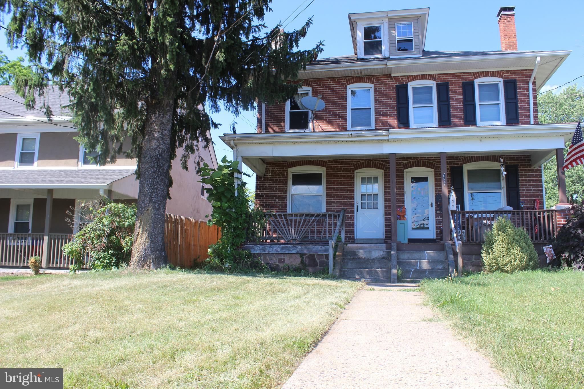 This charming semi-detached brick twin nestled in the Pottsgrove School District is conveniently located near grocery stores, shopping, and major routes, yet tucked away from the hustle of town. This property offers incredible potential for the savvy investor or hands-on buyer ready to add their personal touch and build instant equity.

Enter through the back via a shared driveway to a generous private parking area and large yard. Step inside to a large mud room which has a convenient powder room attached. This mud room flows into a well-equipped kitchen featuring a double sink, garbage disposal, and plenty of cabinet and counter space, plus a dishwasher. The adjacent dining room is spacious enough to accommodate a crowd, and the front family room completes the main living level.

Upstairs you’ll find the primary bedroom with recessed lighting, a ceiling fan, and a small closet, along with two additional bedrooms, one of which has a closet and is a walk-through to the primary. The full bathroom features a shower/tub combo. A walk-up attic provides abundant flooring and additional storage space. The unfinished basement houses the laundry area with even more storage potential.

Outside, enjoy a covered front porch perfect for morning coffee or evening sunsets. The L-shaped yard offers a large private area to enjoy however you see fit.

This home is priced to sell and comparable homes in the neighborhood have sold for significantly more. Sold strictly AS-IS. Buyer is responsible for all Use & Occupancy (U&O) requirements, repairs, fees, and permits as required by the Borough.