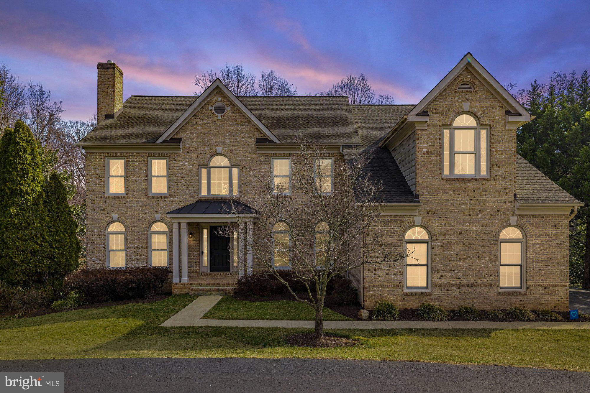 Beautiful colonial home in the sought after Manors at Wolf Trap community. This home has 5 bedrooms, 4.5 bathrooms, 6,150 square feet, and is sited on a .41 acre lot in a quiet cul-de-sac.  As you enter the home you are met with a welcoming foyer that opens up to a formal living and a formal dining room. Gourmet kitchen is a chef’s dream with plenty of countertop space, center island, gas cooktop, stainless steel appliances, and bar seating. Located directly off the kitchen is a spacious breakfast room, and sunroom which brings in an abundance of natural light. Main level also features an office, mudroom, and half bathroom. Upper level owner’s suite boasts vaulted ceiling, sitting area, two walk-in closets, spa-like ensuite bathroom with a soaking tub, walk-in shower with glass barn doors, rain shower head, shower niche, bench, and dual vanities. Three additional bedrooms, two full bathrooms including a Jack and Jill bathroom. The bonus room on the upper level is a versatile space that offers endless possibilities for an in-law/au-pair suite, play room, etc. Finished walk-out lower level features a recreation/media room, game room, fitness studio, storage rooms, fifth bedroom, and a full bathroom. Plenty of space with tons of potential to make your own. Serenity at home with a fenced in backyard, large deck, extensive patio, and hot tub that backs to trees for privacy. Large three car side loading garage and spacious driveway for multiple cars. Transferable membership to Cardinal Hill Swim and Racquet Club—bypassing the 10-year waitlist! Convenient location from Vienna's downtown, Tysons, Wolf Trap National Park for the Performing Arts, major commuting routes, and the Metro, within the Westbriar/Kilmer/Marshall pyramid. HIGHEST AND BEST OFFERS WILL BE REVIEWED AFTER 12 NOON ON MONDAY, MARCH 17TH.