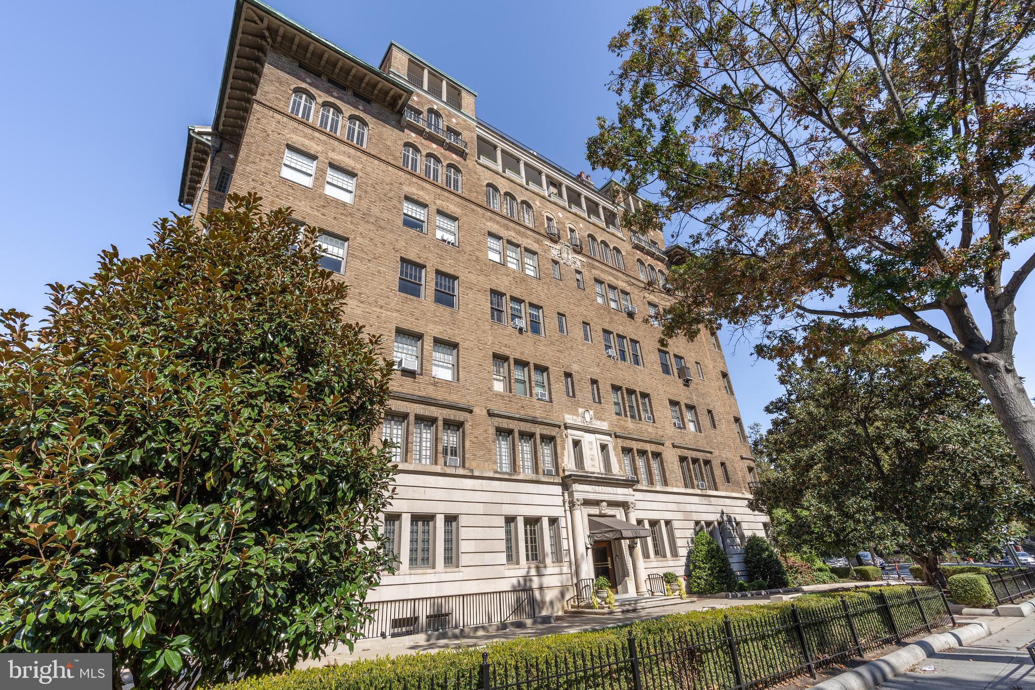 Presenting this sophisticated and richly appointed 6th-floor residence at The Altamont, one of Washington’s most iconic Beaux-Arts buildings. Spanning an impressive 3,150 square feet, this rare 3-bedroom, 3-bathroom home was masterfully created by combining three original units into a singular, seamless masterpiece that occupies an entire wing of the building, offering multiple exposures and abundant natural light through 32 windows.

Step inside to find a gracious foyer leading to a circular gallery, setting the stage for the home’s refined elegance. Throughout, gleaming hardwood floors, soaring 10-foot ceilings, intricate crown molding and paneling, and custom built-in shelving lend timeless character. Oversized windows frame sweeping city views, while two wood-burning fireplaces add warmth and charm to the formal living and dining rooms—perfect for both everyday living and grand entertaining. The modern eat-in kitchen features chef-grade appliances, custom-cabinetry, ample counter space, and a bright breakfast area. 

The king-sized primary bedroom is a peaceful retreat, with an attached sunroom offering panoramic views, a spacious walk-in closet, and a private dressing area with an ensuite bath featuring a deep soaking tub and separate shower. The generously proportioned second bedroom includes a sitting area, ensuite bath, and ample storage. The third bedroom, with custom built-in bookcases and lighting, can serve as a bedroom, library, or office, complete with its own ensuite bath. A separate laundry room and additional storage space round out this exceptional home. Two-car tandem parking space conveys. 

The Altamont, designed by Arthur C. Heaton in 1917, is celebrated as one of DC’s “Best Addresses.” Its grand lobby showcases original terra cotta floors, gilded arches, and intricate plaster details. The building’s roof terrace offers breathtaking views of the city, from the National Cathedral to the U.S. Capitol. Residents enjoy a 24-hour front desk, a party room, and a pet-friendly policy. The monthly co-op fee includes real estate taxes and utilities – and there is no underlying mortgage.

Located in Kalorama, this residence is just moments from the Dupont and Woodley Metro stations, The Phillips Collection, and a wide array of award-winning restaurants, shops, café’s fitness studios, and galleries. The popular Dupont Farmers Market is also a short stroll away.

A rare offering, this home blends old-world charm with modern convenience, and is an opportunity to own a residence of unparalleled distinction.