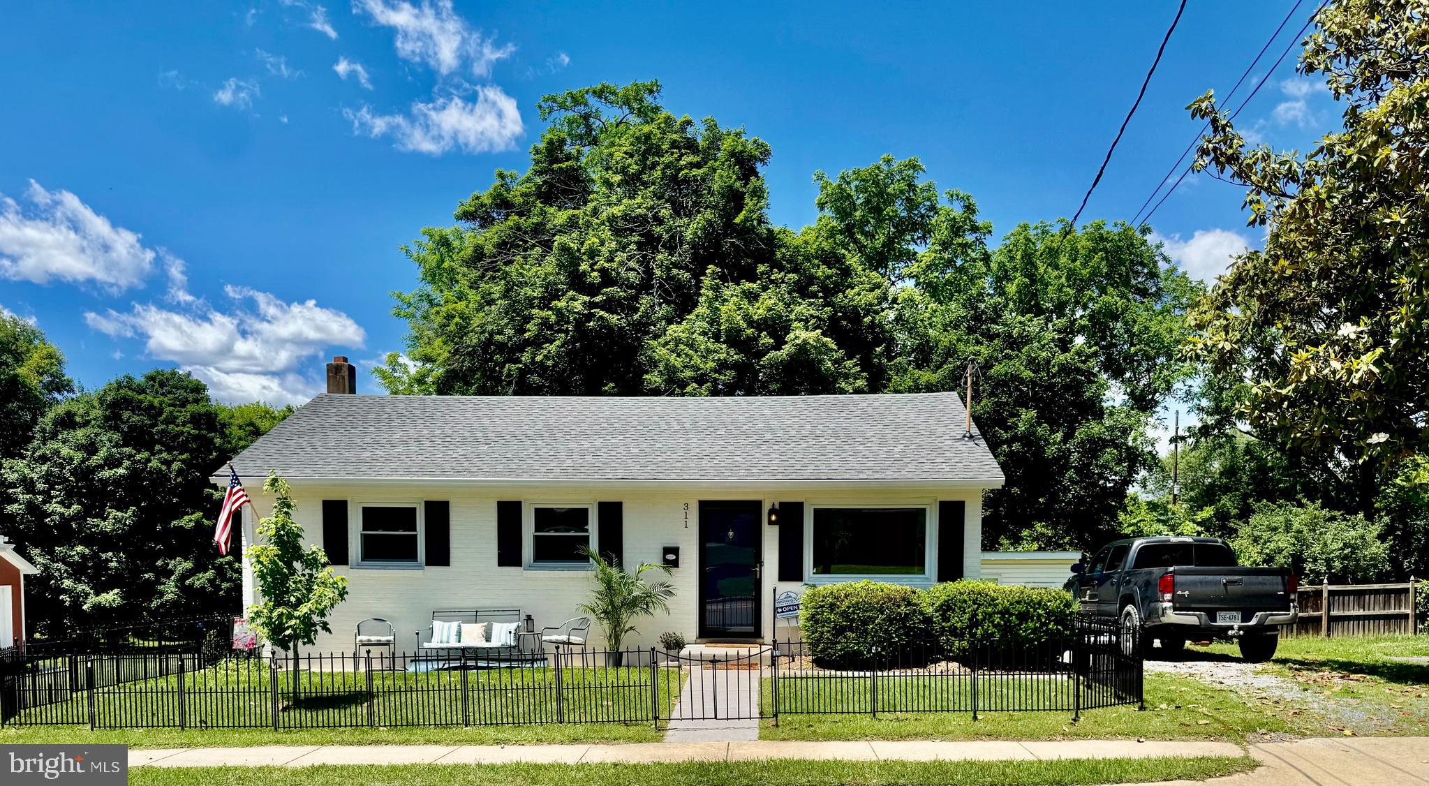 Motivated seller will pay $5k in closing cost. Buckmarsh Cottage is a charming 4-bedroom, 2 full bath home with spacious finished basement nestled at the southern entrance to the town of Berryville, Virginia. The town offers artisan shops and restaurants within walking distance of this newly renovated home. All new Stainless Steel kitchen appliances, new washer and dryer, new mini split air conditioning on each level, beautiful hardwoods refinished throughout main level and new carpet lower level creates a cozy living space, ample storage or office space, bedroom and laundry room. Previous owner invested $20,000 in a complete moisture prevention system of the entire basement so it could be finished by current owners. New deck just completed and fencing along the front of the property. See list of improvements in documents. 4th bedroom in basement is not a legal basement due to window size access. Seller has survey and also staked.