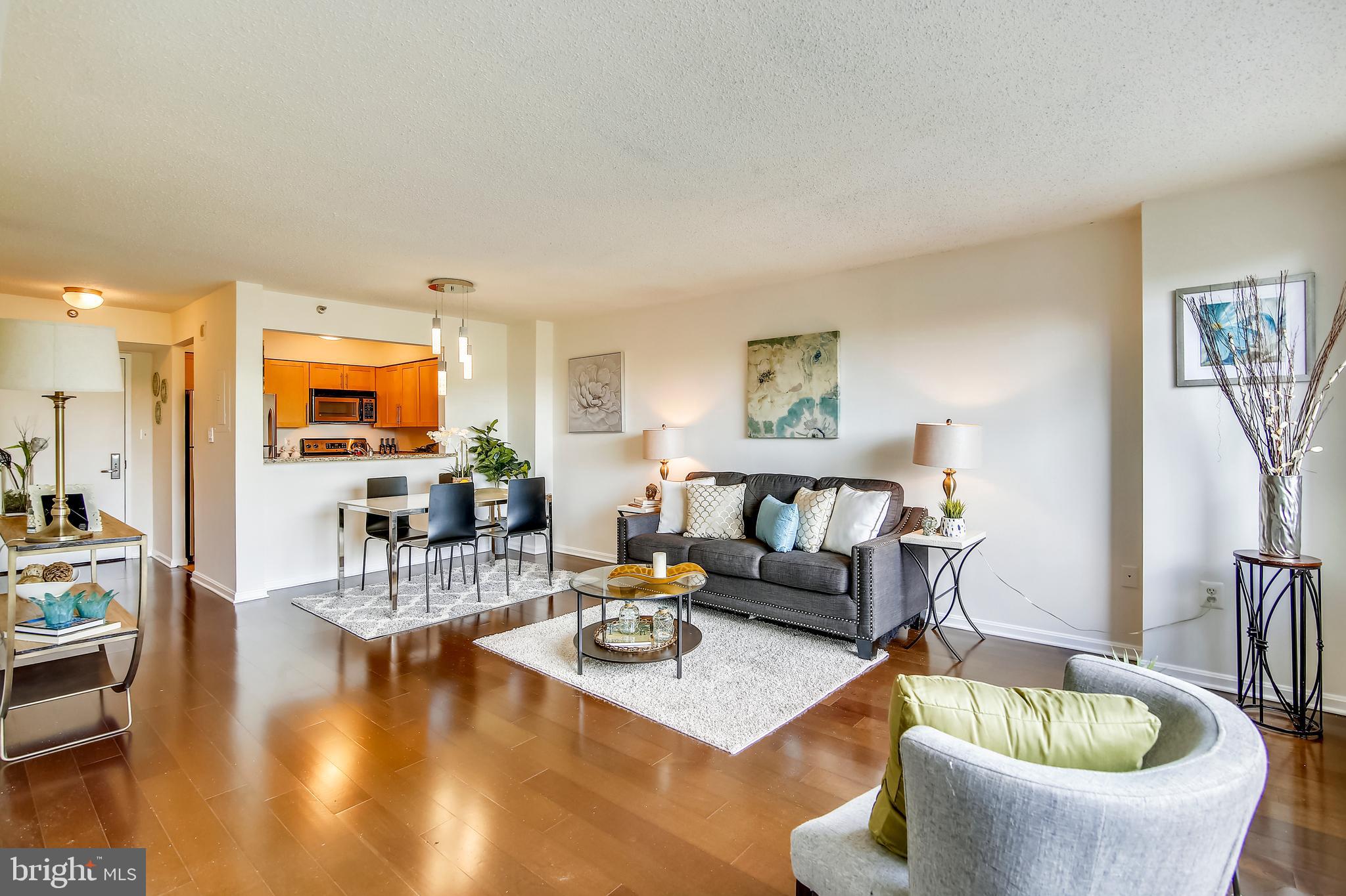 Open House canceled. Become a resident and part of the special community at the amenity-filled building of Grosvenor Park! Enjoy the ease of access to Grosvenor Metro, Wildewood shopping Center, Grosvenor Market, I-495, I-270, Pike and Rose, and North Bethesda Market. Live comfortably in the spacious open floor plan complete with hardwood floors, fresh paint throughout, upgraded kitchen and bathroom, Nest thermostat, and a balcony perfect for a table and chairs or a seating set! Parking space conveys. This building has all the amenities you'll want: swimming pools, huge patio for grilling, fitness center, community room and movie theater, front desk service, and pets allowed! Schedule a showing today!