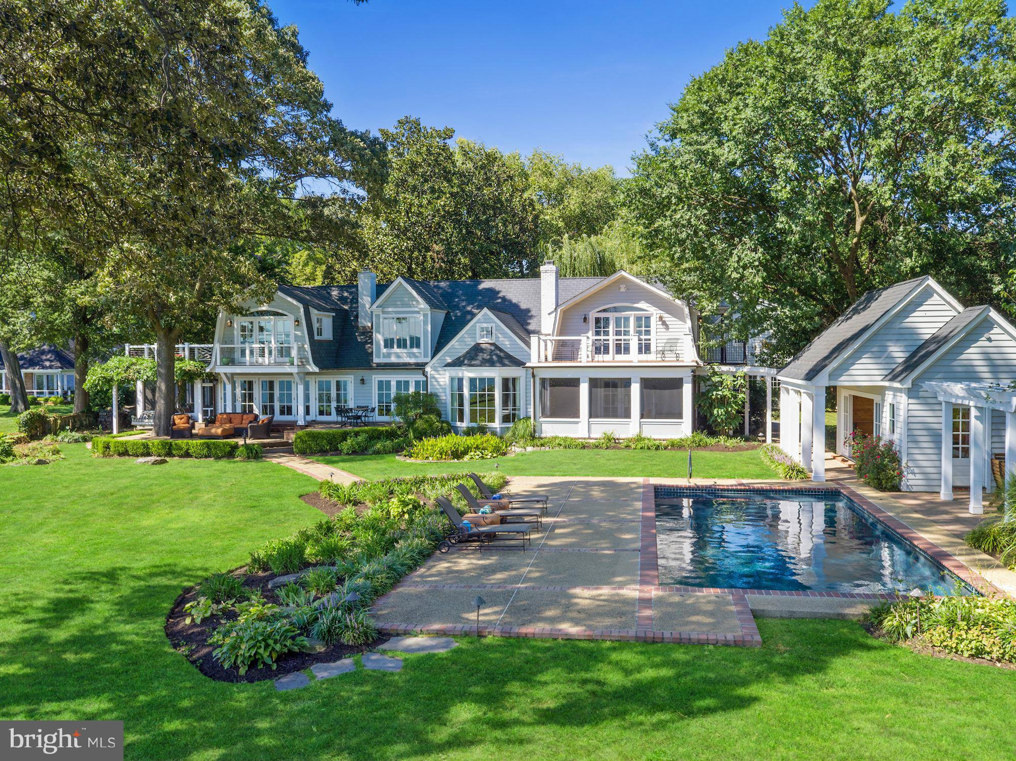 Exquisite waterfront estate with sweeping views of the Severn River from every room.This elegant home boasts: 2 Master Suites, multiple waterside porches, waterfront pool with pool house, guest cottage, 4 car garage. Fine finishes throughout. Waterside privacy on your stunning 1.6 acre lot. Deep water pier. In one of the finest communities on the Severn River w/ easy access to Balt, Wash and BWI.