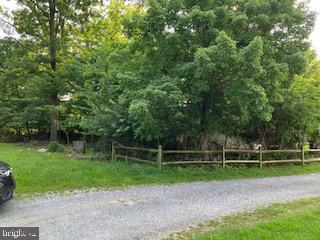 .22 acre wooded lot close to Pen Mar Park and other recreation.  Public water and sewer is available to homes next to this lot but buyer should verify hookup with Washington County.