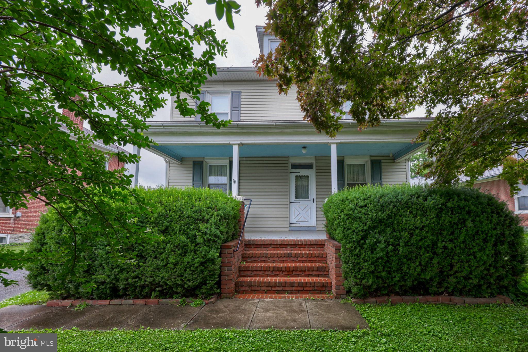 Welcome to a beautifully maintained two-story home set on a generous lot, offering the perfect blend of classic charm just minutes from downtown Lancaster. With easy access to major highways, shopping, and schools, this property delivers a prime location without sacrificing peace and quiet.

Inside, original woodwork and cabinetry give the home timeless character throughout. The main level features a formal living room, a cozy den, and an elegant dining room with chair rail molding, all flowing into a spacious eat-in kitchen with updated flooring. A laundry room with a half bath completes this floor. Upstairs, you will find four generous bedrooms and a full bathroom with a combination tub and shower, while a full walk-up attic offers abundant storage space.

Outside, the full front porch adds wonderful curb appeal and a shady spot to relax, while the large deck provides excellent space for outdoor dining and entertaining. The oversized detached garage is ideal for a car enthusiast, a workshop, or extra storage, and the flat, deep backyard offers plenty of room for gardening, play, or simply enjoying the outdoors.

Conveniently located yet full of charm and space, this home is a rare opportunity to enjoy the best of Lancaster living. Schedule your showing today.