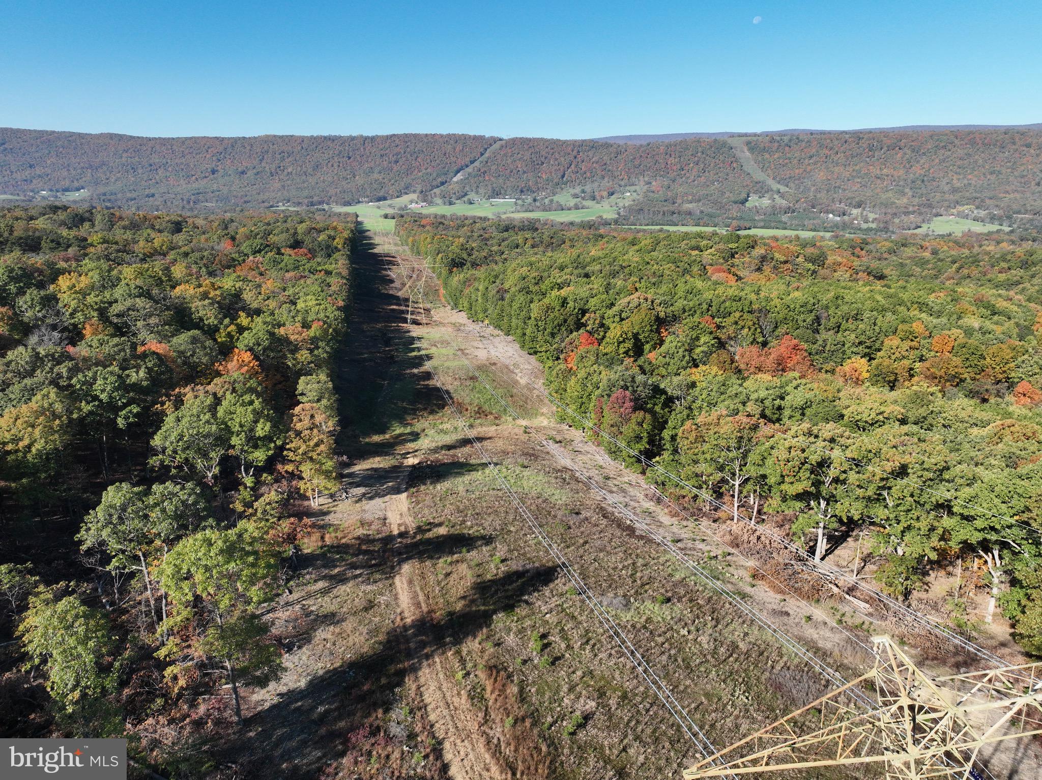 Welcome to Horseshoe Mountain, a 130 AC Premiere Trophy Managed Turn-Key Hunting Property located in Mineral County, WV. This hidden treasure is accessed via a mile-long DEEDED right-of-way from Horseshoe Run Road. The property has been improved with an extensive, updated road system throughout, an off-grid, but fully powered solar cabin that comes fully furnished, with all wildlife management practices implemented. Upon entering the property you will be greeted by one of the food plots overlooked by one of the box blinds that conveys. You will notice the beautiful hardwoods that surround the food plot, and make up the rest of the property with a few pines and other species mixed in. The owner has completed some small cuts, and a 40-acre select cut to improve the property for wildlife management. There have been several smaller cuts made to create bedding areas around the food plots, and to help small game thrive. All work done on the property was designed and completed by the NRCS to specifically improve the property for wildlife. With the abundance of deer and turkey on the property, the steps toward improving the property will make it that much better. The only timber removed was part of the management plan, hence there is tremendous timber value (timber reports available) left if someone would want to harvest it. As part of the plan, you'll find two food plots, two strategically placed watering holes, and an open transitional area under the powerline. All management plan documents can be provided upon request. There are INCOME PRODUCING activities that can be implemented on this property. The owner has applied for the CSP (Conservation Stewardship Program) with the NRCS which pays $4,000 per year with 5 year terms ($20,000). It can be renewed continuously every 5 years. In addition to this, there are two patch openings that remain to be completed and pay  $7,000.00 once completed. This property is ready to produce big whitetails and lots of turkeys, and all it needs is a new driver to take the wheel. To convey with the property are two box blinds, two ladder stands, and 6 hang-on sets that are proven spots to harvest deer. The ladder stand that overlooks the powerline is one of the best spots on the property, and the owner has seen a whopping 69 deer in ONE sitting there before. The powerline runs through the Northeast of the property, and just to the north of it you will find that's where the cabin is situated. A true bonus to this already tremendous property is the cabin that conveys. The cabin is approximately 16'x24' and provides the ultimate retreat for off-grid living with full power at the tips of your fingers. The cabin is improved with solar panels and a solar battery pack for stored power as you need it. This is not your traditional cabin, it’s conventional framing, insulated walls, covered in 40yr warranty metal with engineered trusses. Porch is built out of Trex. Solar and battery backup power. Shiplap pine interior, laminate flooring. Pellet stove, ceiling fan, water system for sink, all contents convey, except for the deer mount and shotgun in the pictures. If you are ready to take your hunting to the next level, this is a one-of-a-kind property where you can take advantage of all the work and effort that has been put into this property. Schedule your very own private tour today, and start building your legacy! Proof of funds required before any showings will be scheduled.