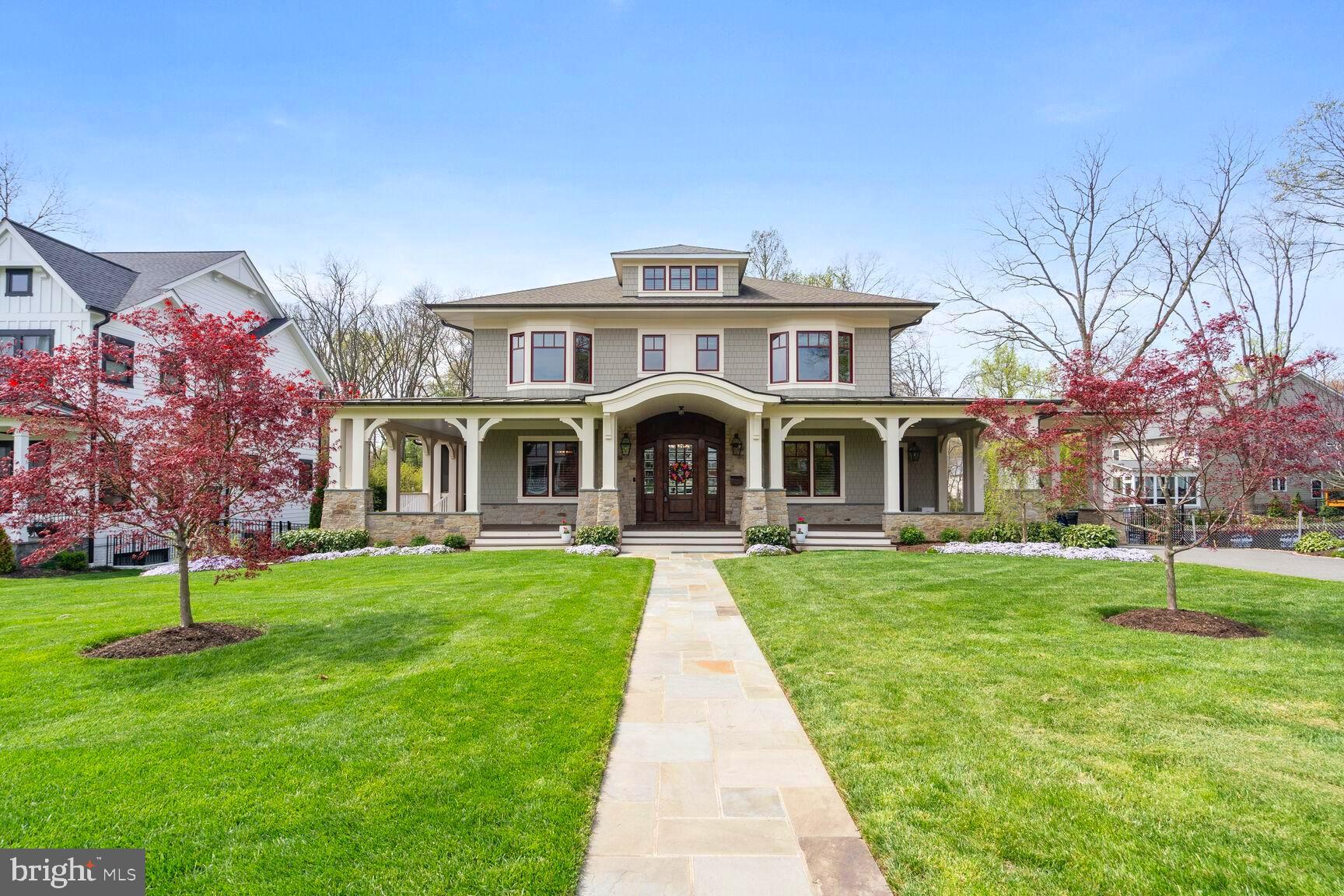 Welcome to your private oasis in the urban suburbs! Why wait for a new build when you can have it all and more- NOW!  Spectacular Custom Craftsman style home built by prestigious DC custom builder of the year, Thorsen Construction and designed by award winning McNeill Baker Design Architects. Luxurious appointments begin with the wrap around TREX porch leading to  the impressive solid  Brazilian Mahogany front door. Once inside, you will be embraced with cloistered spaces inviting you to relax and detach from the bustling city a mere 10 miles away! Gorgeous wainscoting throughout, with over 6500 sqft, 6 bedrooms, 5.5 baths, 10ft. ceilings, custom hardwoods and signature touches. Stunning formal living and dining room with impressive stone front fireplace with custom mantle crafted from  salvaged Hurricane Katrina wood steps out to screened lanai with wood burning fireplace, and upper rear deck overlooking a serene .66 acre lot. Beyond remarkable kitchen with mahogany butcher block island, Wolf gas 6 burner stove with French top and double wall oven, warming drawer, SubZero built in refrigerator and two top of the line dishwashers.  Second pantry/mud/laundry room  with pocket doors and huge quartz topped island  with second refrigerator and remote blinds serves well for catering venues. Powder room has custom sink built from iron gate and wood, both salvaged from Hurricane Katrina. Main level flex room could be office, in-law suite with separate entrance and private bath adorned with marble flooring and remote control blinds.  Upon retiring to the Owners Suite you will have comforts of a ladies dressing room with built-ins, vanity and separate shoe closet, mens walk-in closet and spa like bath with remote blinds, full heated floors, separate soaking tub and a marble steam shower. Two additional bedrooms with en suite baths with non-skid tiling and glass walk in showers with non-skid floors, custom closet shelving and drawers with motion sensor lighting.  4th floor is perfect for use as a playroom, reading nook, bedroom, additional office and has custom shelving and emergency ladder in the wall! The recreation room is set to be tied with custom 1800 bottle wine cellar with doors imported from Italy. Lounge with wet bar has a mini SubZero fridge, dishwasher, warming drawer. Brick tile heated floor in family room; bedroom with full bath and marble flooring. Fully mirrored exercise room with rubber flooring, and traditional Swedish hot stone sauna. Step out to your custom professionally landscaped parklike zen backyard awaiting the best lazy days and enchanting evenings with all of the amenities- outside kitchen with granite countertop, Argentinian grill, pizza oven, outdoor fridge. Soake custom plunge pool with therapy jets, bench, heated by natural gas up to 104 degrees to be used as hot tub and winter pool. wood burning firepit, and covered stone patio. Whole house natural gas generator and Sonos speakers. Super convenient Falls Church location close to all major routes, Reagan National Airport, steps to metro! Welcome home!