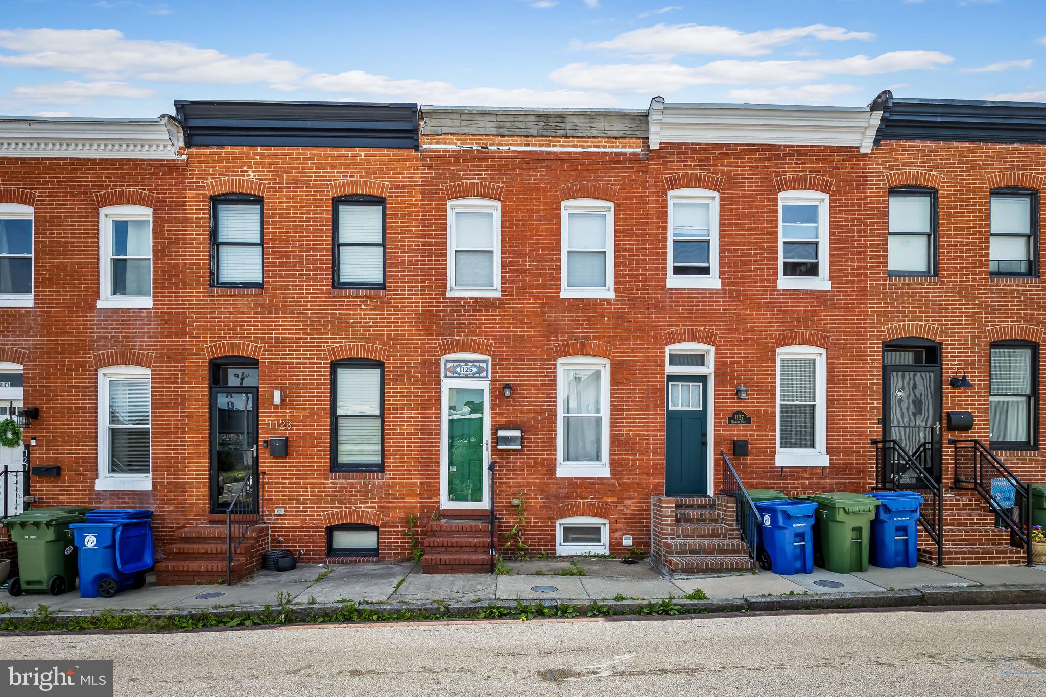Welcome to 1125 Haubert st, a charming Federal-style rowhome in the heart of Locust Point. This home features 2 bedrooms and 2 full bathrooms, offering a perfect blend of historic character and modern comfort.  As you enter, you'll be greeted by the warmth of hardwood floors the beautiful Exposed brick and a sharp interior design that flows through the living  dining room and kitchen.  Your gourmet Kitchen with SS appliances has brand new Granite countertops and ample space to cook.  As you walk upstairs this home offers 2 spacious bedrooms and  2 recently updated bathrooms, including a private ensuite in the primary bedroom.   Step outside to enjoy the private concrete patio, ideal for relaxing or hosting guests. Live in the heart of popular Locust Point steps away from the  free commuter water taxi that will take you all over the city.  Known for cute neighborhood restaurants, Latrobe Park, community tennis & basketball courts, sports fields, walking paths, playground and dog park.  Blocks from Fort Mchenry, and Close to 1-95, I-83, I-895, I-295, I-395, and I-695, Downtown Business District, University of Maryland and Johns Hopkins! A perfect blend of historic character and modern upgrades—this is one you won’t want to miss.
