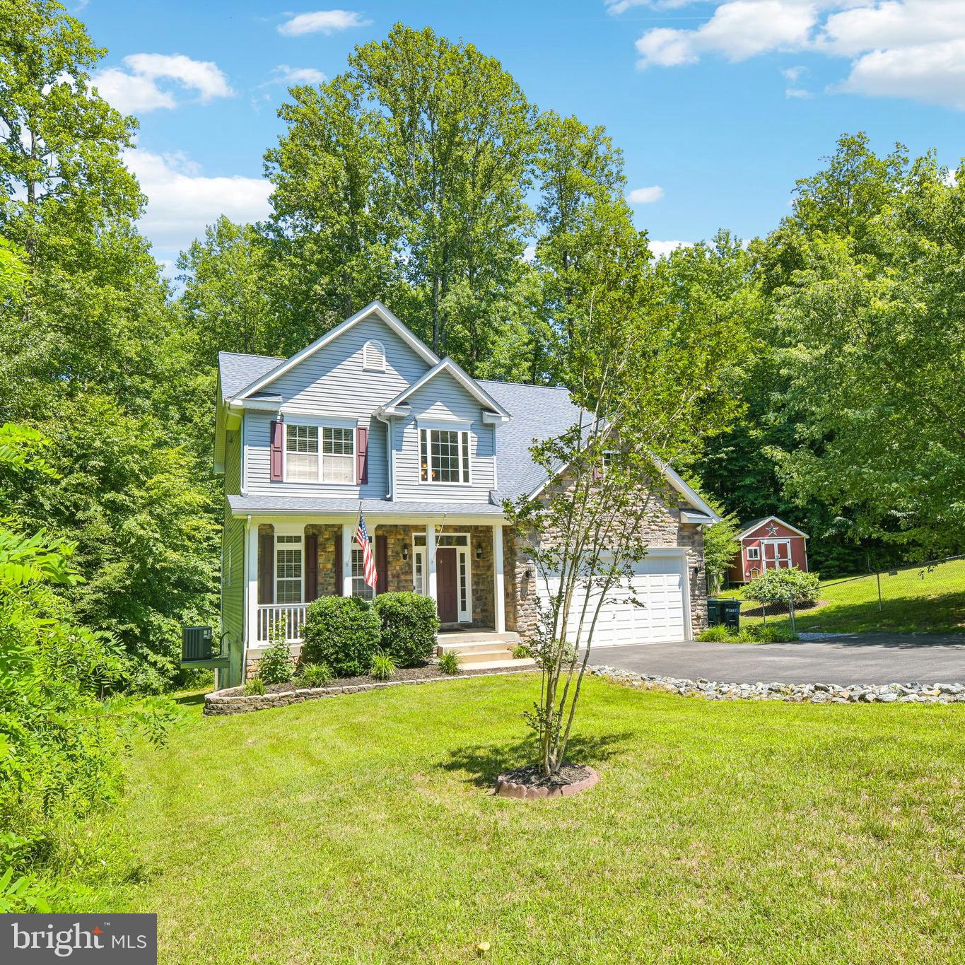*This beautiful Colonial is a true MUST-SEE! * From the grand two-story entrance to the spacious kitchen and inviting family room, this exceptional home offers the perfect combination of elegance, comfort, and functionality.
Nestled in the peaceful community of *Holbrook Estates*, this impressive home features over 3,100 finished square feet* designed for comfortable everyday living and effortless entertaining. The welcoming two-story foyer leads to a beautifully appointed kitchen complete with rich cabinetry, granite countertops, stainless steel appliances, and abundant workspace. The formal dining room is perfect for holiday gatherings and special occasions, while the spacious family room showcases a stunning floor-to-ceiling stone propane fireplace that serves as the heart of the home.

Step outside onto the maintenance-free deck overlooking the backyard—an ideal space for relaxing, entertaining, or enjoying your morning coffee.

Upstairs, the expansive primary suite offers a private retreat with a tray ceiling, a separate sitting area, and a beautifully upgraded primary bath. Three additional generously sized bedrooms and a full guest bath with ceramic tile flooring provide plenty of room for family and guests.

Additional highlights include Hardwood Flooring throughout the main level, an oversized two-car garage, Replaced Roof (2022), New HVAC system (both interior and exterior units replaced), New Hot Water Heater, New Dishwasher a Large Storage Shed, and Paved Driveway.

One of this property's standout features is the extended stone driveway, providing ample space for a camper, recreational vehicle, boat, work trailer, or additional parking.

Best of all, *there is NO HOA*, giving you the freedom and flexibility to truly enjoy your property
Property has restrictions and covenants with the freedom of no HOA payment
This is a home that has been exceptionally maintained and thoughtfully updated—ready for its next owners to move right in and enjoy!