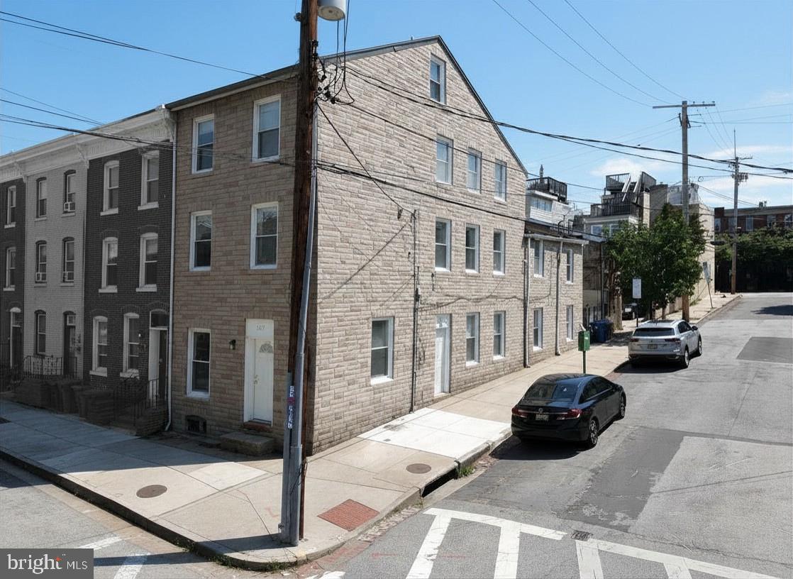 Live in Federal Hill / South Baltimore for less than rent! 

1137 Battery Avenue is a lead-free 2-unit property offering a rare house-hack opportunity: occupy the first-floor 1BR + den apartment and rent the larger 3BR/2BA apartment above. Current rents total approximately $3,400/month, with the upper 3BR/2BA apartment projected at $2,400/month. With 80% financing, projected rent from the upper apartment could reduce your estimated monthly housing cost to approximately $611 toward PITI. With 96.5% first-time buyer financing, the projected net holding cost is approximately $664/month after applying $2,400 in rent from the upper unit.   Call us for details.

Apartment 1 spans the entire first floor with good natural light, hardwood/carpet flooring, basement laundry access, and a full bath. Apartment 2 is the feature unit, offering 15 windows, a multi-level layout, exposed brick, textured ceilings, in-unit laundry, and a loft-style bedroom with en-suite bath. Tenants pay their own gas/electric; no public service gas/electric account for the owner to manage. Lead-free status eliminates recurring lead inspection costs and turnover headaches.

All of this is wrapped in one of Baltimore’s strongest rental locations, with quick access to Federal Hill, Riverside Park, Cross Street Market, Locust Point, downtown Baltimore, the stadiums, restaurants, bars, retail, and major commuter routes. For an owner-occupant or investor, 1137 Battery Avenue combines current income, future upside, and the neighborhood demand that keeps South Baltimore rentals moving.
