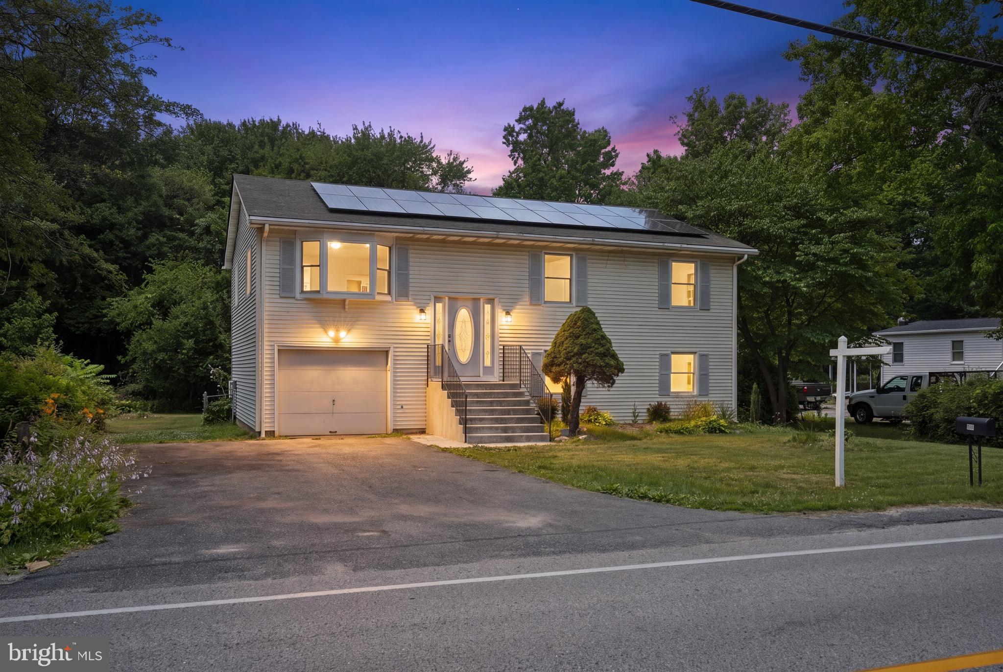 Welcome to 612 Bowleys Quarter Road! Nestled in the heart of Bowleys Quarters in Middle River, this beautifully refreshed 4-bedroom, 2-bath split foyer is move-in ready and offers the perfect blend of modern updates and everyday comfort.
Brand-New Luxury Vinyl Plank Flooring flowing throughout the home, complemented by fresh neutral paint that creates a bright, inviting atmosphere. The updated kitchen features Freshly Painted Cabinetry, New Quartz Countertops, and a Stainless Steel Appliance Package, providing a stylish and functional space for cooking, gathering, and entertaining. Just off the kitchen, a Spacious Deck offers the perfect spot for morning coffee, outdoor dining, or relaxing while overlooking the private backyard.
Improvements continue beyond the cosmetic updates, including a New Hisense HVAC Compressor (2026) and Professionally Cleaned Air Ducts and Vents (2026) for added comfort and efficiency. The flexible split foyer layout offers separated living while the Walkout Basement provides additional living space and direct access to the backyard.
Backing to trees offers privacy and a beautiful natural backdrop. The home is also equipped with 40  Solar Panels that can be transferred to the new buyers, providing outstanding energy efficiency and the potential for significant long-term utility savings. A 4-Car Driveway and deep 1-Car Garage offer ample parking, storage, and workspace, while the Brand-New Garage Door Opener, Motor, and Accessories add everyday convenience and reliability.
Conveniently located just minutes from marinas, waterfront parks, shopping, dining, and major commuter routes, this home combines the charm of the Bowleys Quarters community with everyday convenience. 612 Bowleys Quarter Road is ready to welcome you home. Schedule your private tour today!