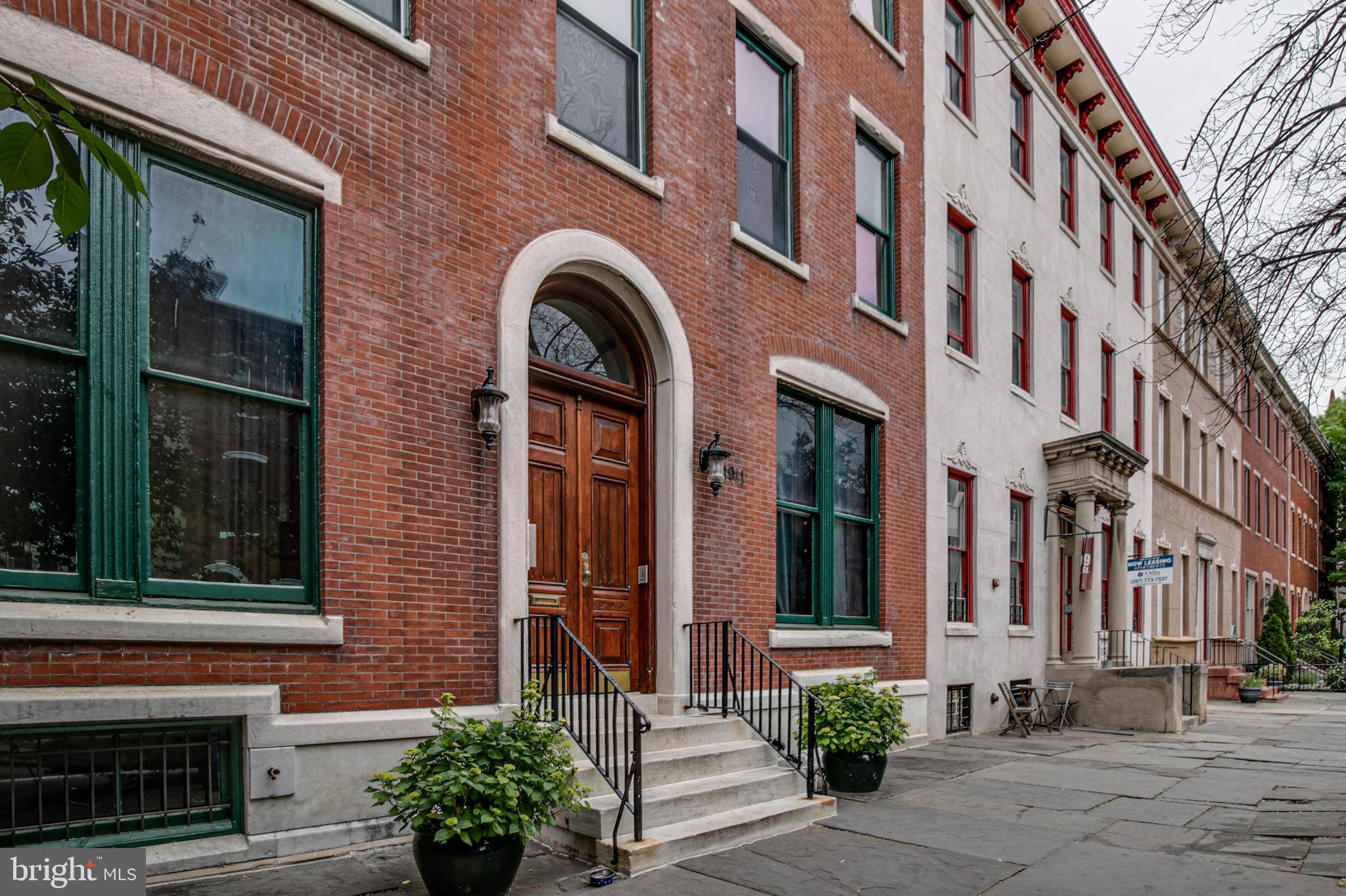 Exciting opportunity awaits! This elegant condo, housed in a historic Victorian mansion in the Fairmount/Art-Museum area, is searching for its new caretaker. Experience a unique blend of historical charm and modern amenities in this boutique community. Enjoy original wooden flooring, a contemporary kitchen with granite countertops and stainless steel appliances, and impressively high ceilings adorned with crown mouldings. The living spaces are spacious and bright, thanks to the large windows.

The kitchen is not only efficient but also expansive, featuring plenty of counter space and a granite high-top breakfast bar - perfect for both cozy dinners and interactive cooking sessions with guests. Storage is ample with a built-in pantry and extensive cabinetry.

Step outside to a private deck, offering a peaceful retreat with views of a beautifully landscaped courtyard and an elegant water fountain. The living room is welcoming with its large south-facing windows and ample space for both relaxation and entertainment. The adjoining bathroom connects to a sizable bedroom, complete with two closets and additional hallway storage for all your essentials.

The building offers convenient amenities like bicycle storage and laundry facilities. Located in the vibrant Fairmount neighborhood, you're surrounded by a mix of award-winning eateries, unique shops, cultural hotspots, and easy access to major highways and public transport. The community is known for its friendly atmosphere and picturesque tree-lined streets. On-street parking is available, with an option for a dedicated spot in a nearby lot. This charming property, with its striking facade, is sure to captivate you from the first glance.