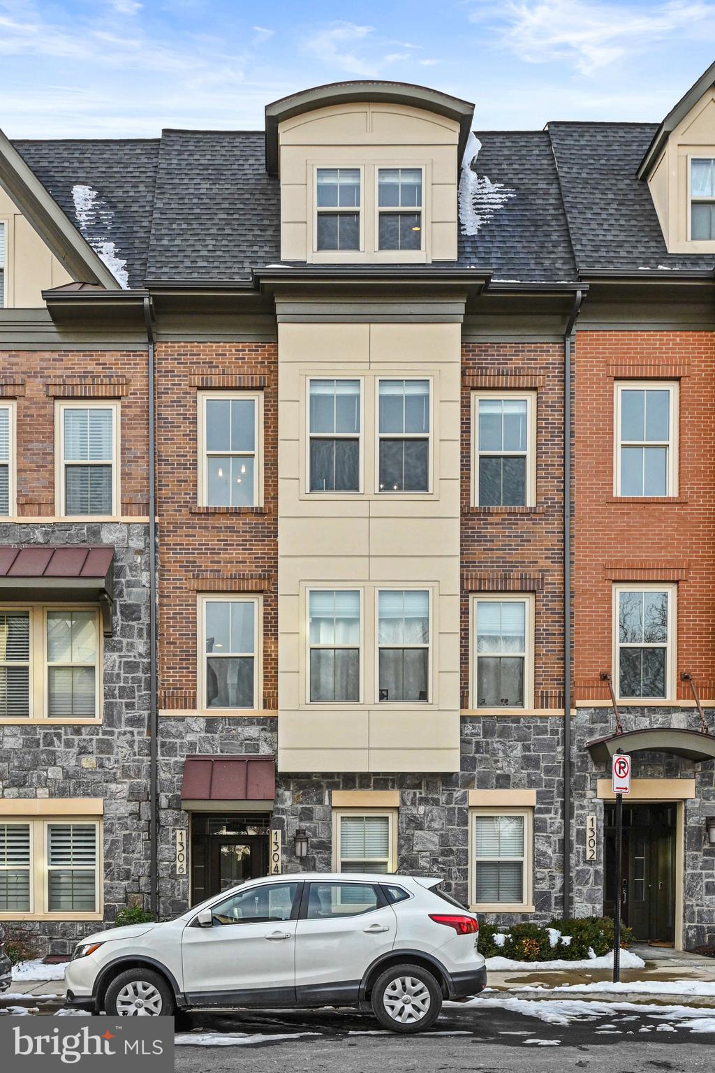 Welcome to this spacious and light-filled townhouse offering the perfect blend of comfort, convenience, and modern living – just steps from the vibrant Columbia Pike corridor!
Tucked away in a well-maintained community with garage parking, this home is walkable to shops, dining, cafes, and parks, making it a commuter’s dream and an urban dweller’s delight.
The main level boasts an open floor plan with beautiful hardwood floors, a gourmet kitchen featuring gas cooking, granite countertops, and stainless steel appliances, plus a bright and airy dining room perfect for entertaining. A cozy family room with a gas fireplace completes the space, offering warmth and charm year-round.
Upstairs, you’ll find two generously sized bedrooms, convenient bedroom-level laundry, and a spacious primary suite with a luxurious en-suite bath and two walk-in closets – your own private retreat.
But the real showstopper is the top-level rooftop terrace – the ultimate spot for unwinding after a long day. Enjoy sunset views, relax under the stars, or fire up the direct-connect gas grill for effortless outdoor entertaining.
With its unbeatable location, stylish finishes, and thoughtful layout, this townhome checks all the boxes.
