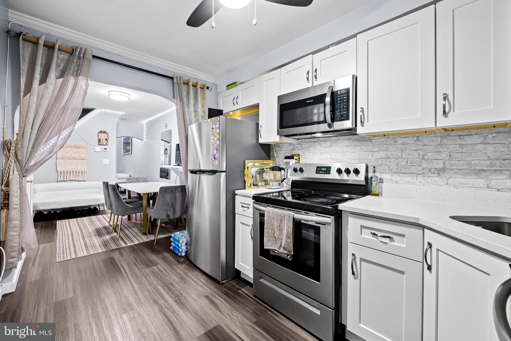 Turn key, fully renovated, and priced at $140,000, this 2 bedroom, 1.5 bath brick rowhome near Union Square Park and Hollins Market presents a sharp opportunity for a first time homebuyer or investor seeking an affordable, move in ready Baltimore City property with long term upside.

Inside, the home delivers clean, modern finishes without cutting corners. The updated kitchen features granite countertops and stainless steel appliances. You will also find luxury vinyl plank flooring, central air conditioning, a main level powder room, and rare main level laundry, a feature that materially improves day to day livability and rental appeal. This was a thoughtful renovation completed by owners who intended to occupy the home, not a quick flip.

For buyers, the value proposition is straightforward. Own for less than many rental payments. An FHA buyer may see an estimated monthly payment around $1,200, subject to lender verification. Add in available grant programs for qualified buyers and the barrier to entry drops even further.

For investors, this is a plug and play asset in a neighborhood that continues to evolve. Strong rental demand driven by proximity to major employment hubs including University of Maryland Medical Center and Downtown Baltimore. The location also offers direct access to commuter infrastructure including West Baltimore MARC Station, I 95, BWI Airport, and the Baltimore Washington Parkway, which broadens your tenant pool to DC commuters.

The private fenced rear yard adds functional outdoor space, ideal for tenants or owner occupants with pets or those who value low maintenance outdoor living.

Positioned near Union Square, Hollins Market, Camden Yards, and the broader Southwest Baltimore growth corridor, this property sits at the intersection of affordability and future appreciation potential.

Move in ready. Income ready. Grant eligible. Schedule your showing today.