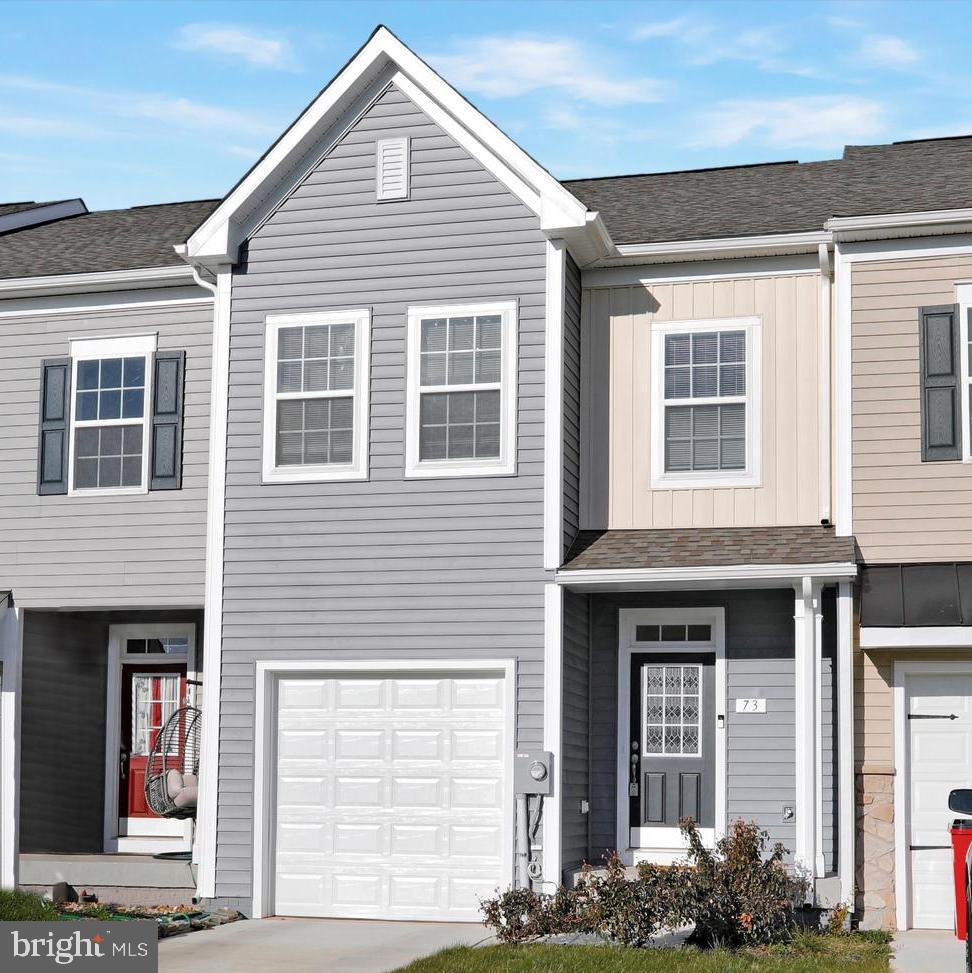 Beautiful Litchfield II Model, practically new! Three bedrooms, two full and one half bath.  This home has 2x6 construction, one car garage, plus a walk-out basement with rough-in for a future full bath.  There are hardwood floors on the main level, quartz countertops, and upgraded kitchen cabinets. The primary suite boasts tray ceiling, the bath has a double vanity and large shower. The laundry is located on the bedroom level.  Convenient South Berkeley location with easy access to I81.