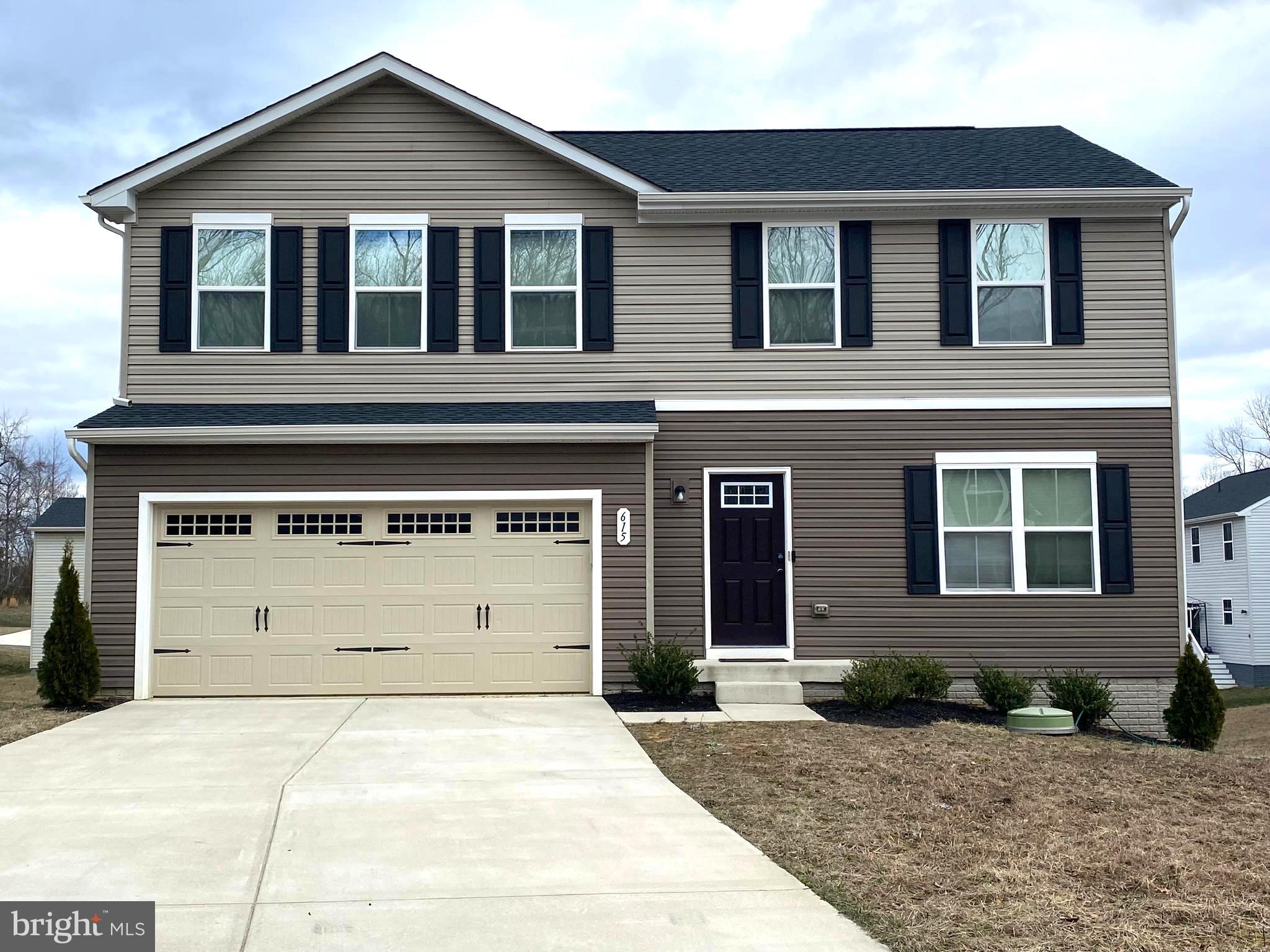 There is no place like home! This three year young home is waiting for you! The owners have tastefully selected options and colors for the look that is sure to please. The exterior features and landscaping provide an inviting curb appeal. The main level boasts an open floor plan with luxury vinyl plank flooring.  The living/dining room combo flows through to the spacious cooks kitchen. Rich dark cabinets, LED lighting throughout, Stainless steel appliances, pantry,  Large Island with seating, AND space for a breakfast table! Don't want to eat in? Head out the back door to the maintenance free deck  that overlooks the large backyard for your outdoor delight. The entry closet, powder room, flex room (office, bedroom, play room, etc) and  garage entrance complete this main level. The upper level is easily accessible with a mid rear entry staircase. This level hosts four bedrooms, two bath and laundry. The primary bedroom is spacious enough for the largest of furniture. Plenty of natural light and an oversized walk in closet. The primary bath has an oversized shower and double bowl vanity. The three remaining bedrooms are larger than normal, w/walk in closets, and all within close access to the shared hall bath and linen closet. Did I mention the laundry room is on the bedroom level? The unfinished, walk out basement level is a canvas awaiting your creativity and personal touch  to call your own.  For now,  it offers plenty of storage area, so you can park the cars in the garage. The exterior door leads into the huge backyard that awaits your imagination for an outside oasis. There is a builder installed generator hook up. This freshly painted, newly carpeted home is ready for your tour. Located in a cozy Stafford community that offers minutes to Rt 1, I95, commuter lots, VRE, Quantico, shops, restaurants, and more.