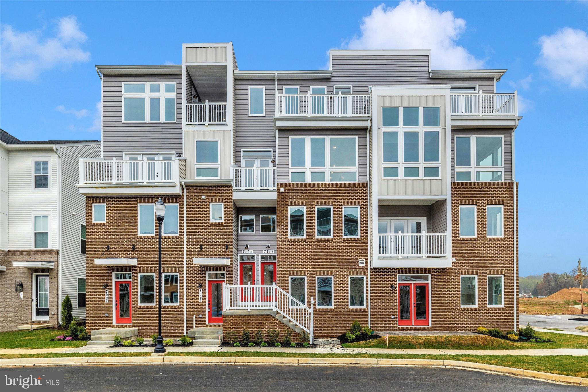 This condo offers exceptional value for over 2,200 square feet of brand new construction, featuring 3 bedrooms plus a dedicated office nook. If you’re looking for space, natural light, and privacy without the upkeep of a townhome, this rare end-unit condo delivers.

One of only two of its kind in the community, this home offers additional windows and just one shared wall, allowing it to live larger than most townhomes while still providing the ease of condo living in a newer construction setting.

The main level is thoughtfully designed for both everyday living and entertaining. The spacious kitchen features a 12-foot island, ideal for cooking, hosting, and gathering. The layout offers an open feel while still maintaining defined spaces between the kitchen, dining area, and living room. A fireplace anchors the living space, and the oversized terrace extends your living area outdoors, perfect for dining, relaxing, or unwinding at home.

Upstairs, all three bedrooms are generously sized. The primary suite includes its own covered terrace, creating a private and comfortable retreat. The main-level office nook allows all bedrooms to remain dedicated sleeping spaces, offering added flexibility for today’s lifestyle.

Additional highlights include a one-car garage and a brand new in-unit washer and dryer. With abundant natural light, well-proportioned rooms, and a highly functional layout, this home stands apart from typical rental options.

Ideally located just minutes from I-70, I-270, Route 15, and downtown Frederick, this is a rare opportunity to rent one of the largest and most desirable condos in the community, now at an even more attractive price.