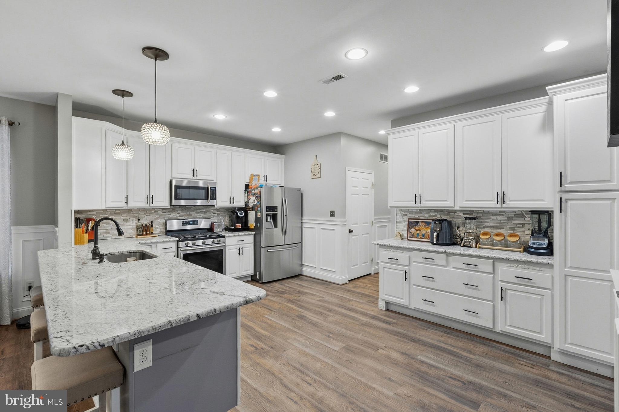 This Stunning Home built by Anderson Builder is located on the Corner lot in the Parkside Community.  This 4 bedroom, 2 1/2 bath home welcomes you as soon as you enter into the home. The 2-story foyer provides an embracing warmth separating the dining and living room.  The Large office can be access by the double doors off the living room or by the hall entrance. A butler's pantry connects dining room and kitchen. This lovely kitchen complete with cabinet and countertop space. Why not just add a few chairs to enjoy the view.  This open floor plan from the kitchen, breakfast area and great room offers functional entertaining or a cozy setting for you to enjoy the gas fireplace.  Enjoy the outdoors on the beautiful paver patio off the great room. . All bedrooms are located on the 2nd floor. The large primary bedroom with 2 walk-in closets, let's not miss the owner's bath with tub and separate shower. Each of the secondary bedrooms have walk-in closets. The full hall bathroom is located on the 2nd floor. The laundry is located on the main lever providing access to the 3rd car garage. Irrigation system, water soften, surround sound in the great room and electric car charge are included. Is this Beautiful Home yours? Schedule your tour before it's too late!
