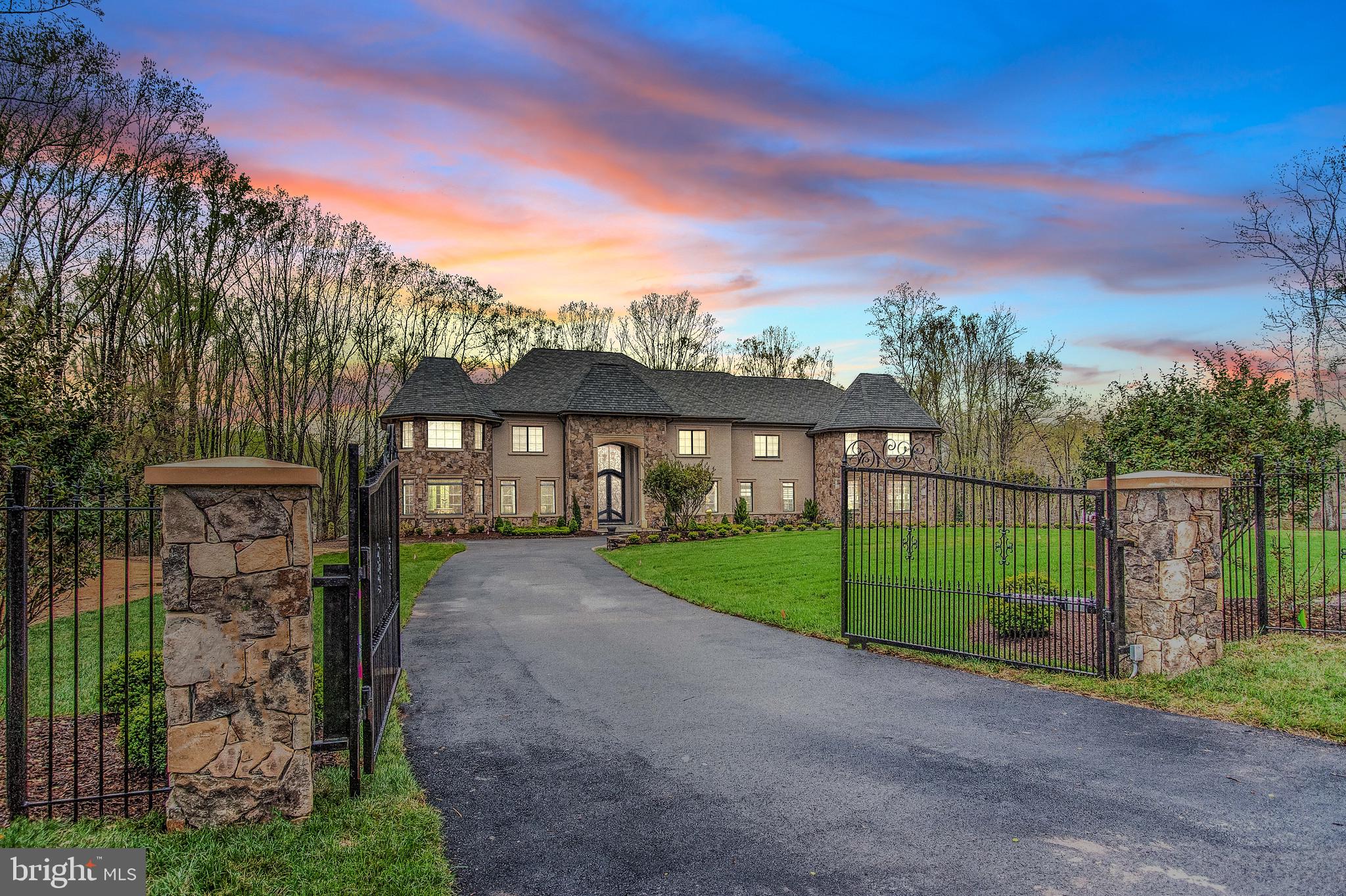 Fabulously set on nearly 3 gated acres in McLean's Peacock Station neighborhood rests this like-new mansion offering top-quality construction & materials. With over 13,000 finished square feet on the three elevator- serviced levels, our features include: dramatic open floor-plan on the main level, massive main kitchen with seperate caterer's kitchen, sumptuous owner's suite with "must-see" extensively built-out closets and luxury bath, a true entertainer's lower-level with large bar, dry & steam saunas, cinema, game rooms and more. Garage parking with 4-bays and an amazing expansive deck overlooking the rear grounds large enough for a potential pool.