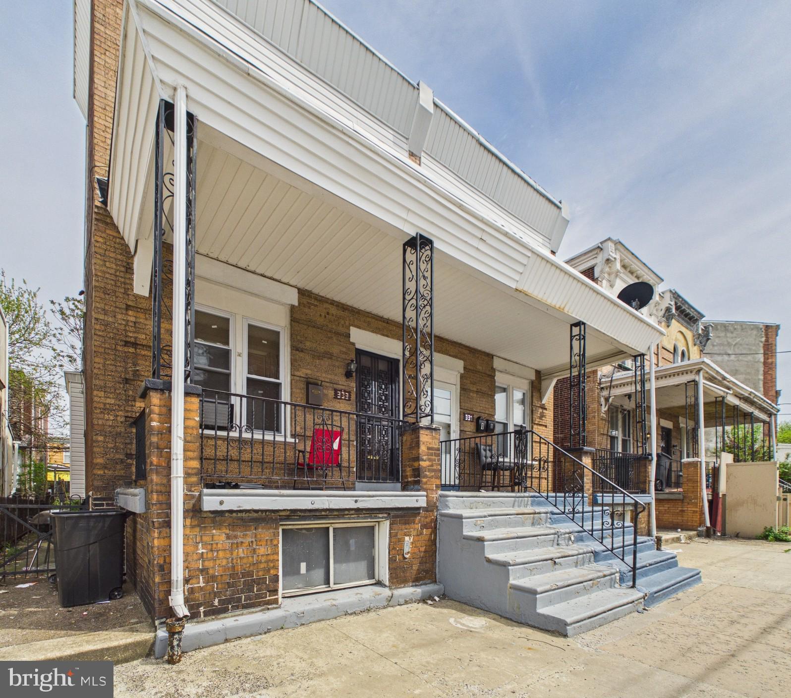 This spacious 3 bedroom, 1.5 bathroom home is located in West Philadelphia, just moments from Mill Creek Playground. Offering a comfortable layout and charming details, this property is a great opportunity for a homeowner or investor alike. The first floor features a large open common area with living and dining space, vinyl plank flooring, decorative fireplace, and forced heat. The kitchen is equipped with an electric stove, refrigerator, and tile backsplash, with a convenient half bathroom located just off the kitchen. Upstairs, you will find all three bedrooms along with a full tiled bathroom featuring a shower and tub combination. Additional highlights include a front porch, rear patio, and washer and dryer hook-up in the basement.