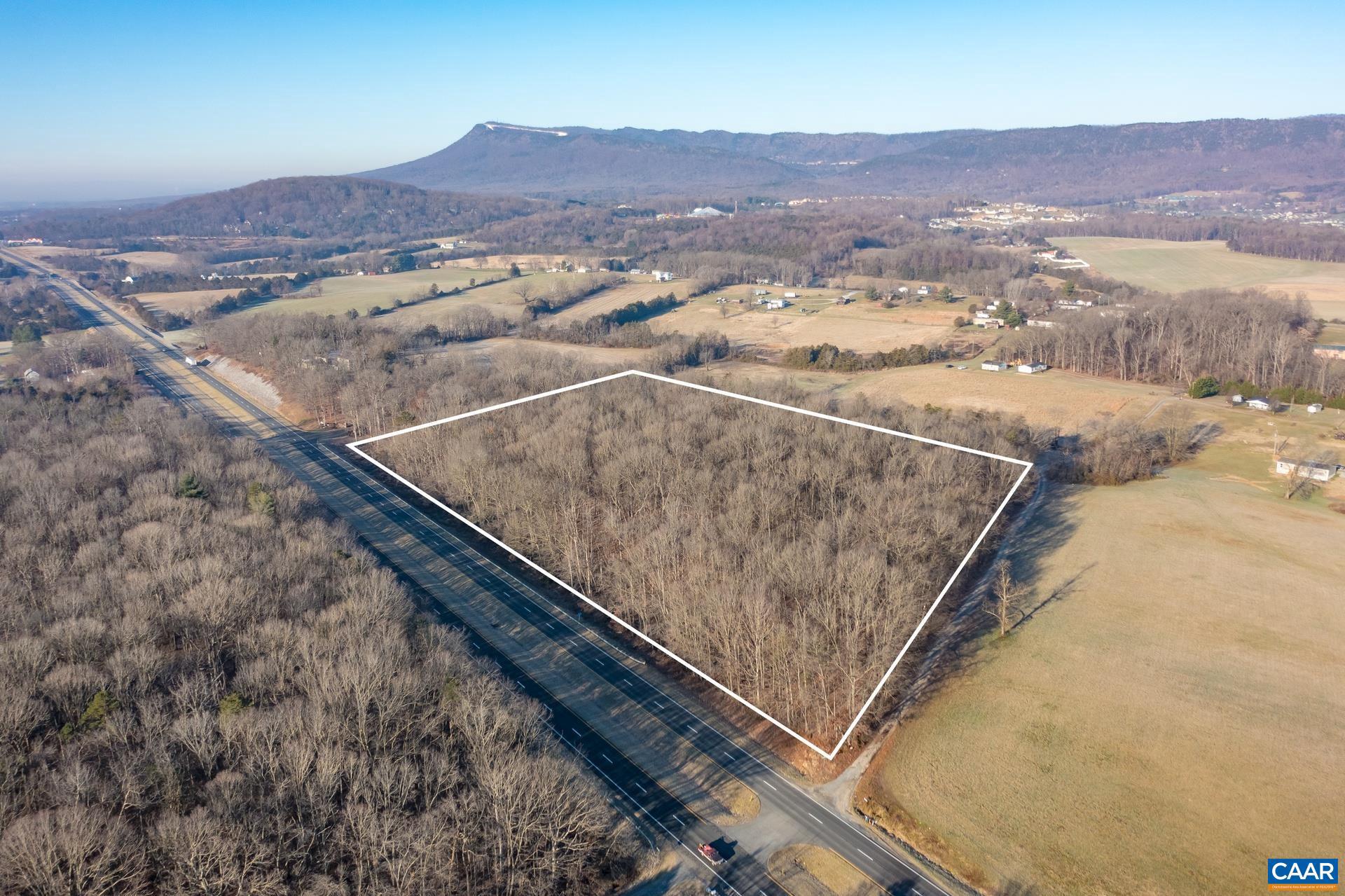Idyllic setting on 9.640+/- acres along Route 33, located under 3 miles from Massanutten Resort and around 3.5 miles to the Town of Elkton.  Enjoy views of the Blue Ridge Mountains and the convenience of nearby shopping.  Parcel is wooded and zoned A-2, with 950+/- feet of road frontage.  The timber on the parcel was valued at $20,000 gross and conveys with the land.  More information can be provided upon request for serious purchasers.