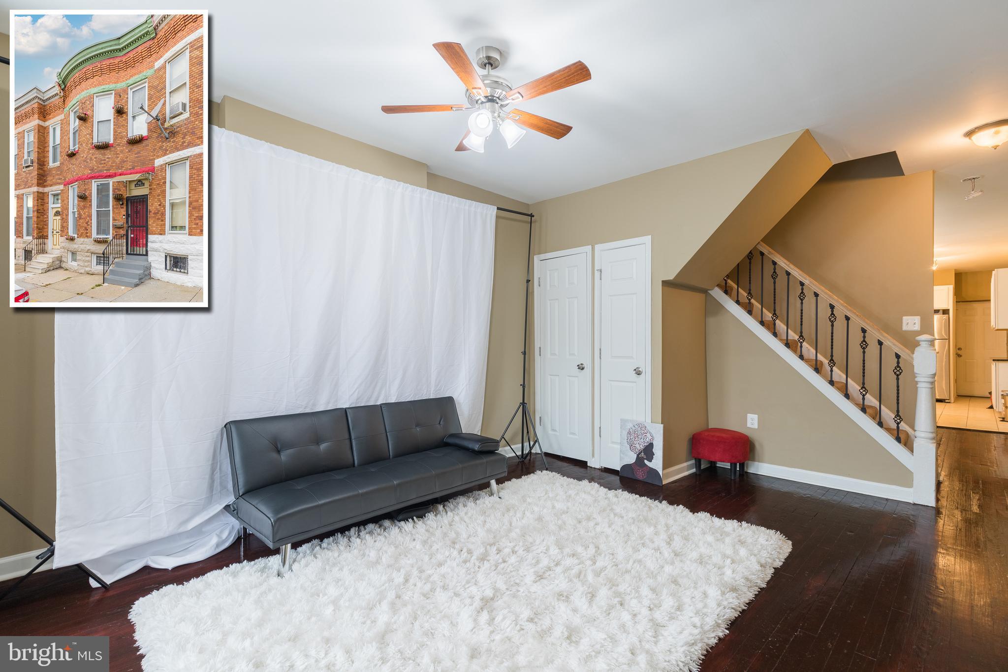 PICTURE PERFECT MOVE-IN READY ROWHOME WITH DESIGNER KITCHEN!  Spacious living room and separate dining room w/ hardwood floors, Chef's kitchen w/ granite counters & ss appliances, main level half bath, upper level w/ 3 generously sized bedrooms & 1 full bath, full basement w/ laundry area, and rear patio! Newer plumbing, electrical, roof, & windows. Pack your bags and move right in!