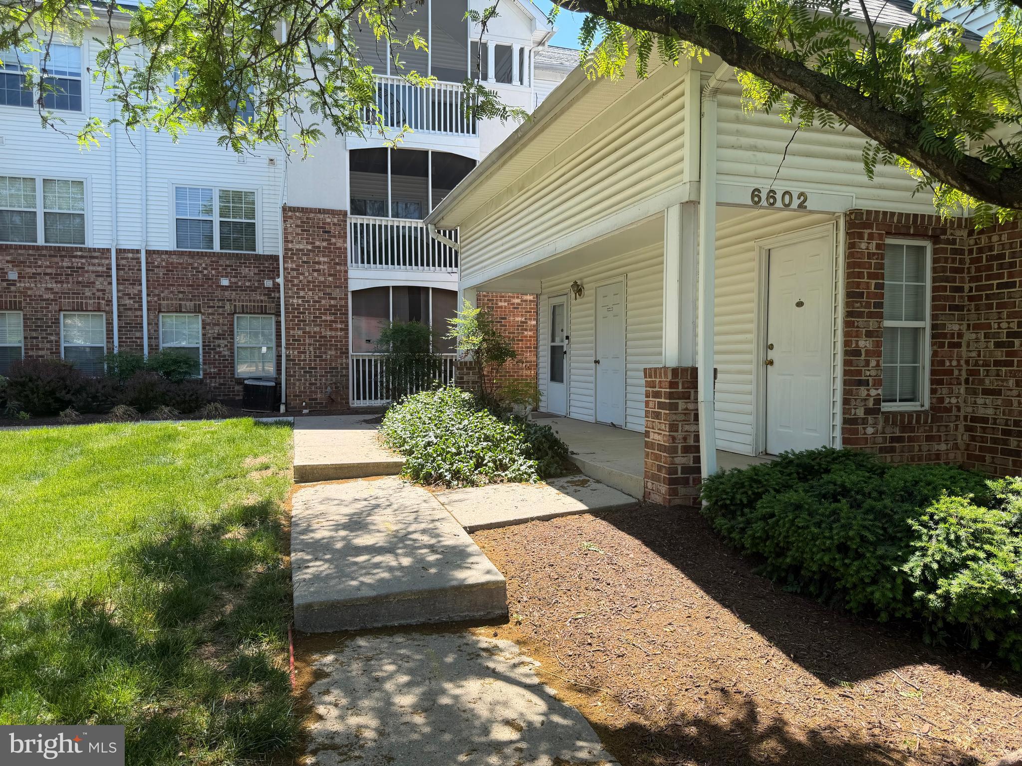 Lovely 2BR/2BA condo with den in sought-after Greenbelt Lake Village! This spacious unit features an open-concept layout, updated kitchen with granite countertops and stainless steel appliances, in-unit washer/dryer, and a versatile den/sun room perfect for a home office or additional living space. The primary suite offers a large walk-in closet with built-in shoe rack and private bath with soaking tub, while the split-bedroom layout provides added privacy. Enjoy a screened-in patio, fireplace, assigned parking, and secure building entry. Community amenities include pool, fitness center, clubhouse, walking/jogging trails, and scenic lake views. Conveniently located near Greenbelt Metro, BW Parkway, I-495, NASA, shopping, dining, parks, and major commuter routes.