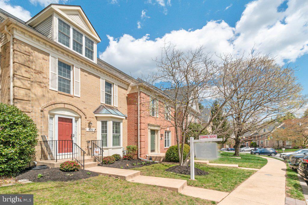 Welcome to this stunning, move-in-ready home that offers a perfect blend of style, comfort, and functionality. The spacious great room features a gourmet kitchen with a  six-burner gas range, double wall ovens, a microwave/convection oven combo, quartz countertops, butcher block island, and stainless steel appliances. Luxury vinyl plank flooring flows throughout, anchored by a cozy gas fireplace. Sliding glass doors open to a deck with serene views of the woods and pond. A convenient half bath completes the main level.

Upstairs, you’ll find three bedrooms and two full baths, including a luxurious primary suite fully updated in 2021. The spa-like bathroom boasts heated floors, a custom-tiled curbless shower, and double sinks with quartz countertops. A large walk-in closet offers ample storage. Cathedral ceilings enhance the spacious feel, and a second-floor laundry room adds convenience.

The fully renovated walk-out basement,  is an entertainer’s dream with a full bath, custom bar and woodwork, river rock wainscoting, a gas fireplace, and a custom barn door leading to a large storage area. Step outside to the private patio for peaceful outdoor living.

The third-story loft, bright and airy with abundant natural light, offers a versatile bonus space perfect for a home office, media room, guest area, or creative studio. Whether you’re working, relaxing, or hosting, this flexible loft adds valuable living space to fit your lifestyle.

Additional updates include Pella windows, and doors (2018), roof (2016), a radon mitigation system, and a split HVAC system added to the primary suite and loft for year-round comfort. This meticulously maintained home truly has it all!