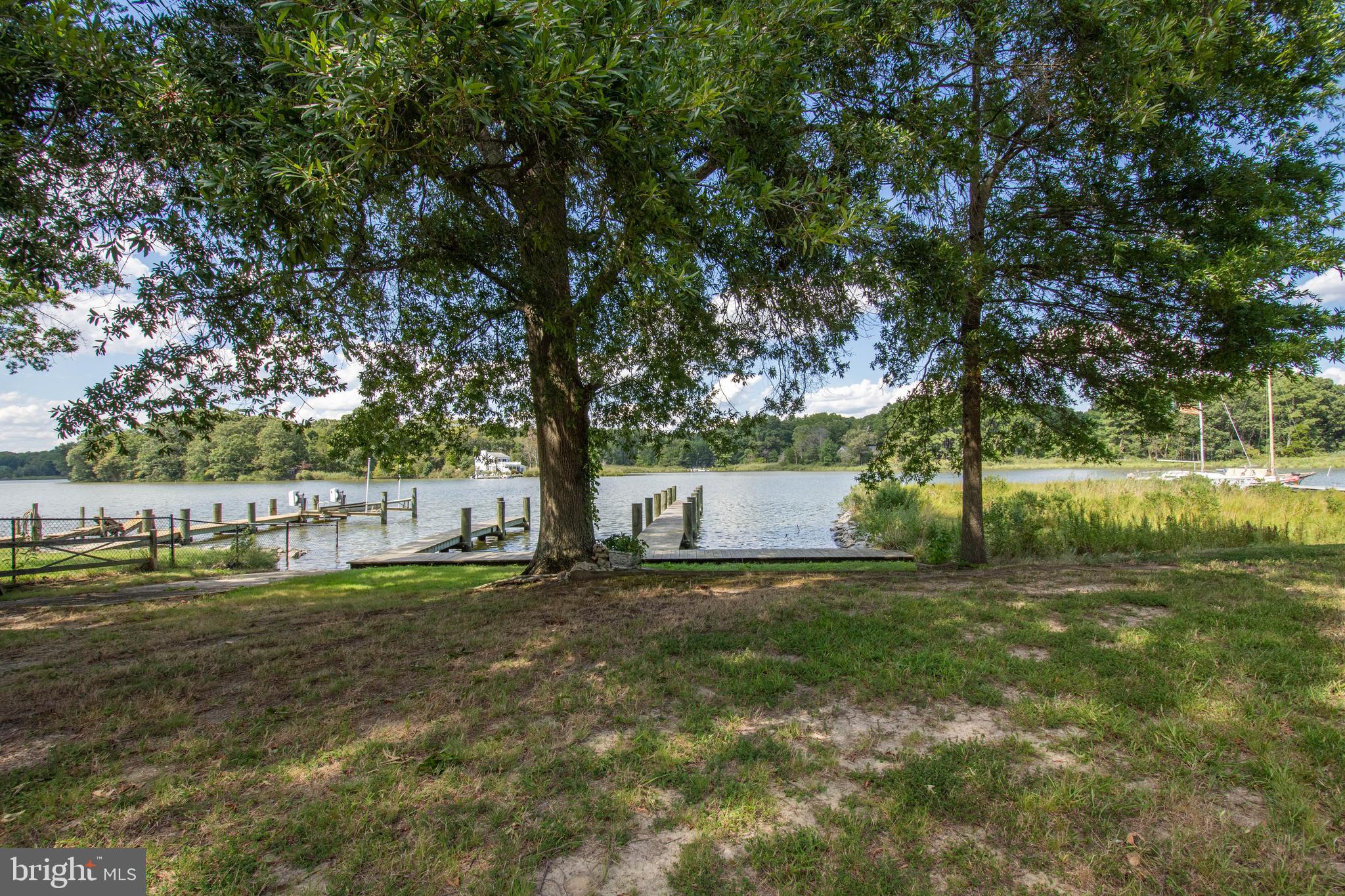 Level, open 60' wide waterfront lot on Carr's Creek with access to Chesapeake Bay! Beautiful, serene views. Bulkhead, 2 piers and small boat launch ramp are in place! Public sewer with sewer tap in place! The home next door at 968 Main Street is also listed for sale. Purchase both and you will have it all, a nice home, the waterfront features and the major investment value of a waterfront buildable lot. Check out the waterfront home listing at 968 Main Street, Deale.  Great location 45 minutes from Wash D.C. or BWI airport. 25 minutes from historic Annapolis.  Within a few minutes of waterfront restaurants, marinas, shops, library and more! Deale Beach also has a waterfront community clubhouse.