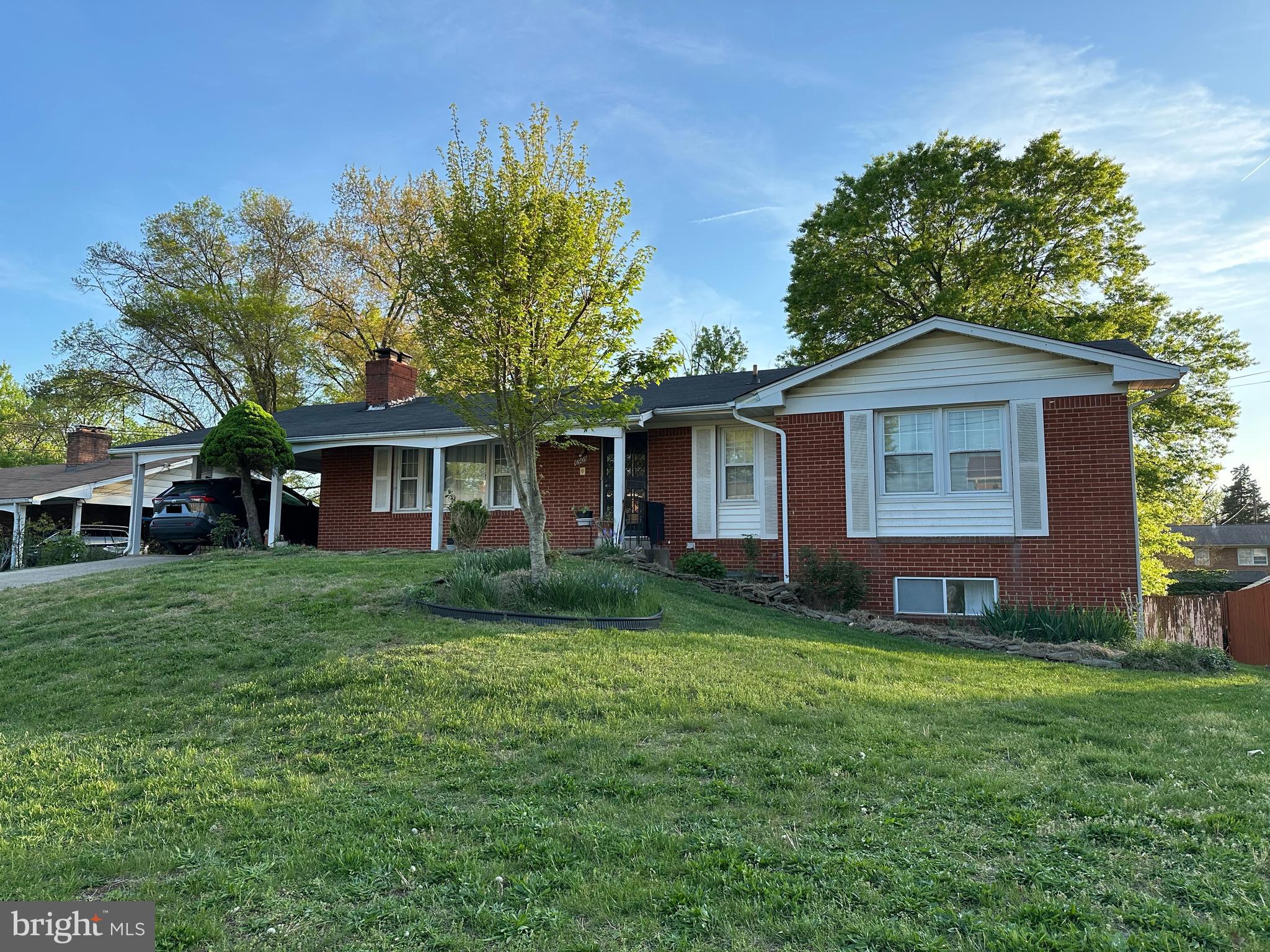 Spacious 5BR/3FB solid brick rambler with a carport and an oversized driveway that easily fits 4–7 vehicles—plus open street parking available. Sitting on a 0.29-acre lot with no HOA, this home offers over 3,000 sq ft of total space (estimated). Main level features a generous eat-in kitchen, a cozy living room with a fireplace, and a separate dining room. There are large bedrooms, including an owner’s suite with its own private full bath on this level as well. The fully finished walkout basement adds flexibility with a full bath, a second kitchen, and multiple additional rooms/dens—ideal for guests, in-laws, or extra living space. Fenced backyard with deck and patio. Recent updates include a roof that's approximately 8 years old, a brand-new AC compressor, and a stove and washer that are about 3 years old. Leased solar panels help reduce utility costs. Conveniently located less than half a mile from the Southern Regional Technology and Recreation Complex, with easy access to nearby bus routes #35 and W14. With close proximity to Bock Road, Oxon Hill Road, I-295, and I-495, getting around the DMV area is easy. You're also just minutes from shopping and entertainment—less than 2 miles to Rivertowne Commons Marketplace, Oxon Hill Plaza, and Rosecroft Shopping Center, and under a 10-minute drive to MGM National Harbor, Tanger Outlets, and all that the National Harbor has to offer!You're also just minutes from shopping and entertainment—less than 2 miles to Rivertowne Commons Marketplace, Oxon Hill Plaza, and Rosecroft Shopping Center, and under a 10-minute drive to MGM National Harbor, Tanger Outlets, and all that the National Harbor has to offer. Seller may need rent back.