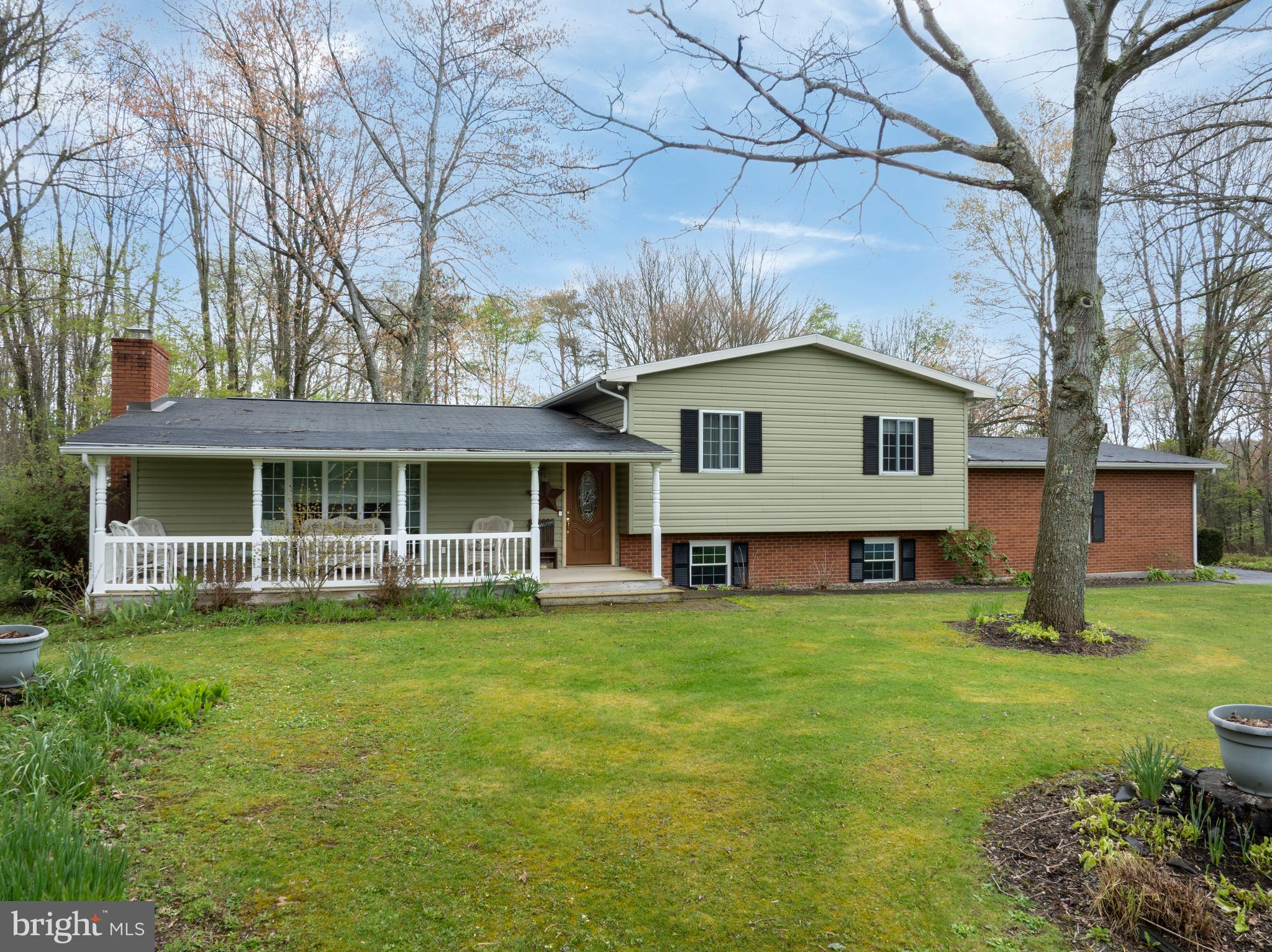 Tucked at the end of a cul-de-sac on .52 acres, this 3-bedroom, 2-bath split-level home offers a private setting just minutes from State Game Lands.  A covered front porch welcomes you into a spacious living room with a beautiful stone fireplace with  propane insert.  The spacious, updated, eat-in kitchen is light and bright opens to the backyard and in-ground pool area, creating an ideal space for outdoor entertaining and everyday enjoyment.  Schedule your showing today!