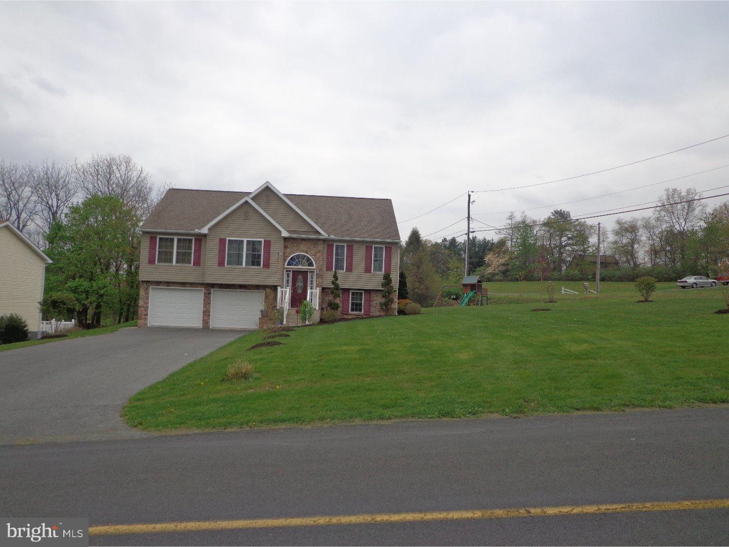 Open concept floor plan with vaulted ceilings, master suite, spacious family room with half bath, deck perfect for bbq's, great corner lot, shed, oversized 2 car garage, lots of storage space, Main Floor laundry, Eat In Kitchen with all appliances included.