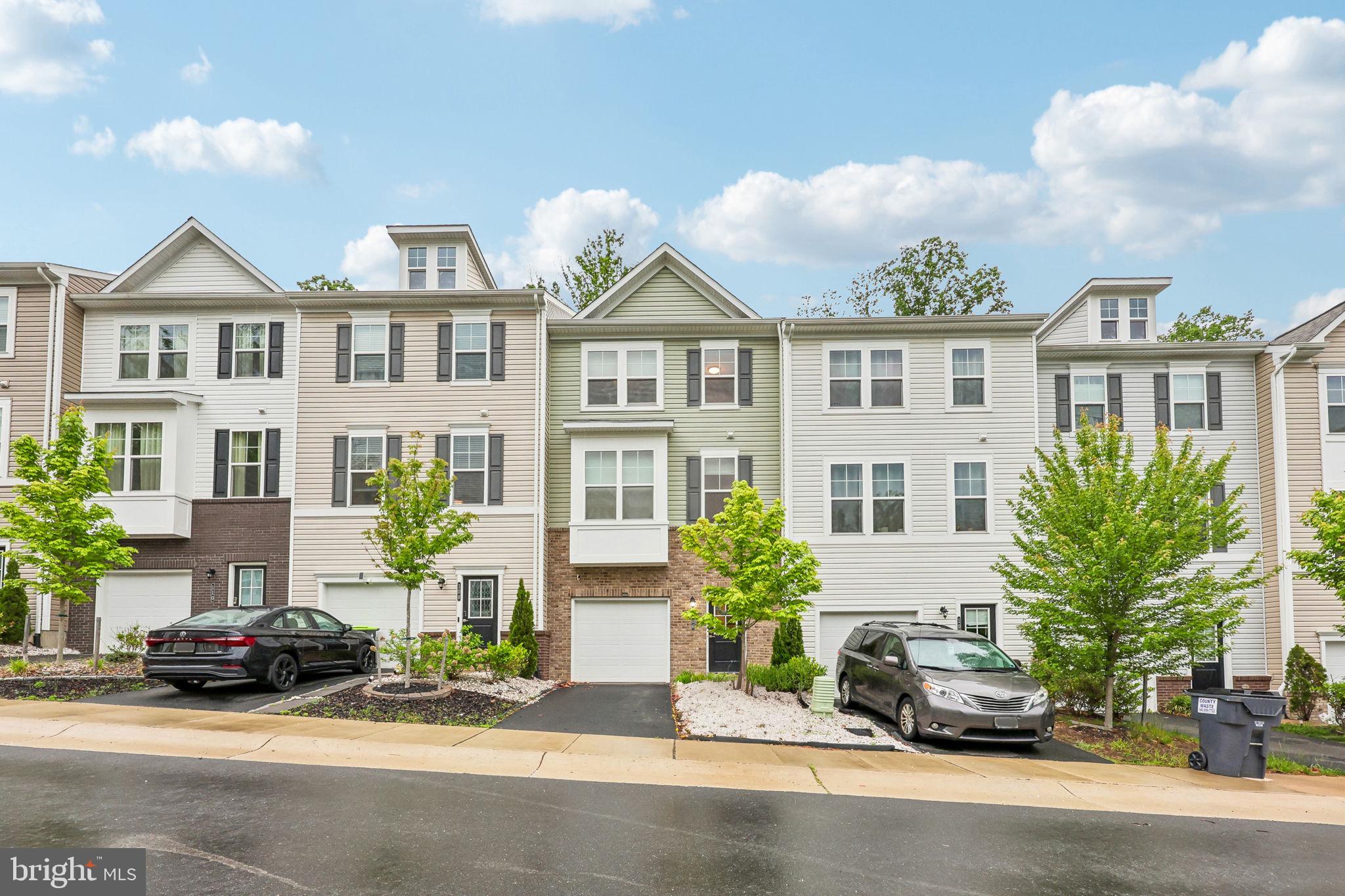 Five minutes to Base Quantico! Perfect off base military housing. Welcome to 106 Lentz Ln! You’ll love this beautifully maintained townhome featuring 4 bedrooms, 3.5 baths, gleaming hardwood floors throughout, and a spacious open-concept layout filled with natural light. It lives large. The kitchen is truly the heart of this home, offering a large island with seating, gas cooking, abundant cabinet space, and a spacious pantry. The open great room flows seamlessly to the covered deck and fenced backyard with treelined views. 

The entry level includes a private bedroom and full bath, ideal for guests, a home office, gym, or an excellent 'house hack' opportunity. Garage and driveway parking, plus ample guest neighborhood parking.

Spacious primary suite featuring two walk-in closets and a spa style bath with double vanity and oversized shower. Freshly painted, professionally cleaned, and ready for you!

Conveniently located near shopping, dining, major commuter routes, Interstate 95, Route 1, Marine Corps Base Quantico, and Fort Belvoir. Schedule your tour today!