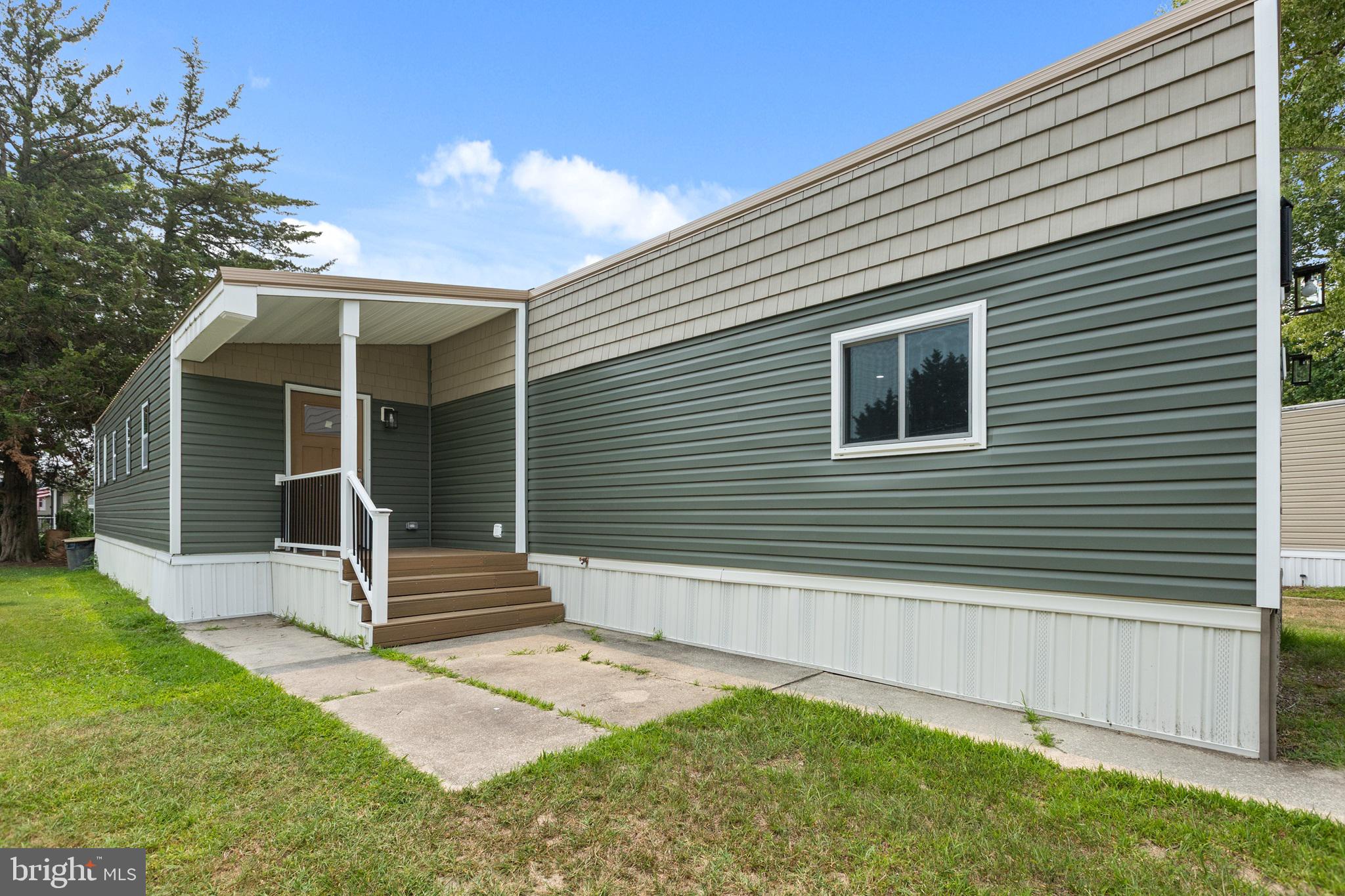 Coastal living meets modern comfort in this beautifully modified Marshfield Aquarius home in the sought-after waterfront community of Angola Beach & Estates. Extensively remodeled and thoughtfully expanded, this exceptional residence offers 3 bedrooms, 2 full bathrooms, and approximately 980 square feet of stylish, move-in-ready living space.  Designed for today's lifestyle, the home features a spacious, open layout enhanced by the addition of the third bedroom and second full bathroom, providing added flexibility for guests, a home office, or multigenerational living. Quality updates throughout create a fresh, contemporary feel, while major system improvements offer lasting peace of mind, including a new metal roof (2024) and HVAC system and water heater, both approximately two years old. Step outside and embrace the coastal lifestyle that makes Angola Beach & Estates one of the area's most desirable waterfront communities. Residents enjoy an impressive collection of amenities, including two swimming pools, two playgrounds, tennis and basketball courts, and a private kayak/canoe launch, perfect for exploring the scenic waters of Herring Creek and Rehoboth Bay.  Ideally located within the Cape Henlopen School District and just minutes from historic Lewes, Rehoboth Beach, Cape Henlopen State Park, marinas, shopping, dining, and Delaware's award-winning beaches, this property offers the perfect balance of tranquility and convenience. Whether you're searching for a full-time residence or weekend retreat, this turnkey home delivers exceptional value, modern updates, and an outstanding location. With its thoughtful updates, functional layout, low-maintenance living, and move-in-ready condition, it's also an ideal choice for first-time homebuyers looking to begin their homeownership journey without sacrificing style or location. Schedule your showing today and discover everything this beautifully renovated home has to offer!