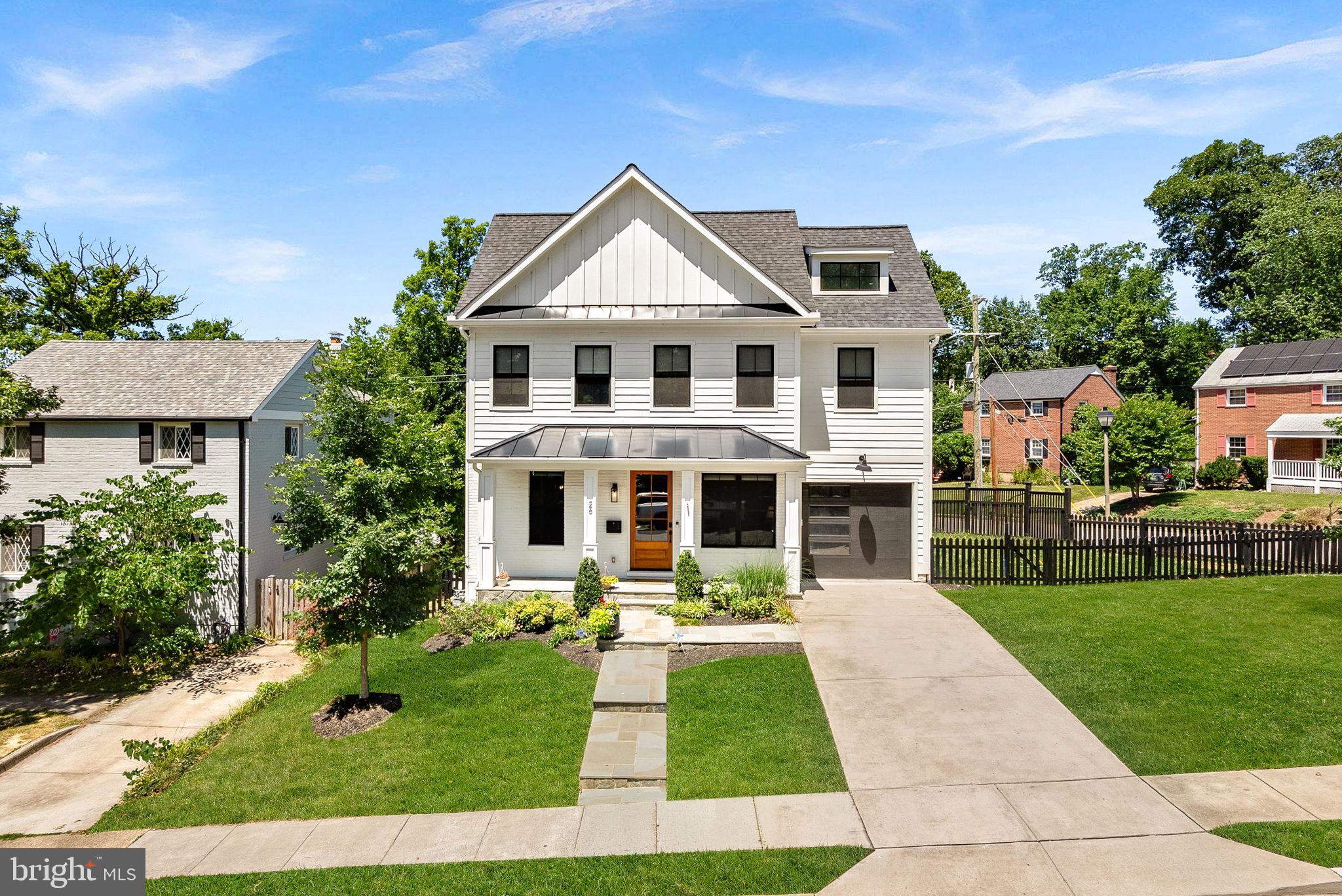 Open House: Sunday, June 28 | 11 AM–1 PM
Stop by and tour this remarkable home while enjoying complimentary ice cream from an on-site ice cream truck. 

Nestled in the heart of sought-after Arlington Forest, this exceptional custom-built BOLT Builders residence offers a rare combination of luxury craftsmanship, thoughtful design, and superior construction. Built in 2020 by the owner-builder for his own family, no detail was overlooked in creating a home designed for both everyday living and long-term durability.

An impressive oversized wood front door sets the tone for the home, opening to a stunning foyer featuring designer textured wallpaper, soaring ceilings, exceptional millwork, upgraded two-piece crown molding, and expansive Marvin Essential fiberglass windows that fill the space with natural light. The main level showcases a formal dining room, private office, elegant butler’s pantry, and a chef’s kitchen centered around an oversized island. Designed for both entertaining and everyday functionality, the kitchen features a premium KitchenAid appliance package and abundant workspace. The adjoining family room is anchored by a gas fireplace and striking grid coffered ceilings, with direct access to the rear deck overlooking the backyard. Just beyond, the breakfast area opens to an additional side deck, seamlessly blending indoor and outdoor living.

The upper level features a spacious central landing and flexible bonus area perfect for a study space, homework station or reading lounge. Three spacious secondary bedrooms are complemented by a beautifully appointed hall bath. A conveniently located upper-level laundry room adds everyday functionality. The luxurious primary suite serves as a true retreat, featuring its own gas fireplace, tray ceiling, private balcony overlooking the side yard, and a spa-inspired bath complete with a soaking tub, dual vanities, and premium finishes throughout. The fully finished walk-up lower level offers exceptional versatility with a spacious recreation room, dedicated media room, legal fifth bedroom, full bath, and abundant storage. Engineered floor systems were utilized throughout the home to create elevated ceiling heights.  The exterior is equally impressive, offering multiple outdoor living spaces, including a private primary suite balcony, expansive composite decking, and a walk-out lower level. 

Beyond the stunning finishes, this residence was engineered from the ground up with a focus on efficiency, durability, and long-term performance. The home was constructed using the advanced ZIP System® wall and roof sheathing, with liquid-applied flashing extending to the foundation to create an exceptional weather, moisture, air, and insect barrier. Designed for efficiency and comfort, the home features spray foam insulation, high-performance attic insulation, a two-zone Carrier HVAC system, and smart thermostats.

Built by the owner-builder for his own family, this residence showcases a level of craftsmanship, quality, and attention to detail rarely found in today’s market. From the engineered building envelope and premium materials to the custom millwork, built-ins, engineered wide plank white oak flooring, and thoughtful design throughout, every element reflects a commitment to excellence.

Located in one of Arlington’s most beloved neighborhoods, Arlington Forest offers the perfect balance of community and convenience. Enjoy easy access to Lubber Run and Glencarlyn Park and its popular amphitheater events, nearby trails, parks, dining, shopping, and commuter routes. The home also features a garage, private driveway, and ample street parking for family and guests.

This is more than a home, it’s a thoughtfully crafted custom residence where luxury finishes, exceptional construction, and an unbeatable location come together to create a truly remarkable living experience. Welcome home.