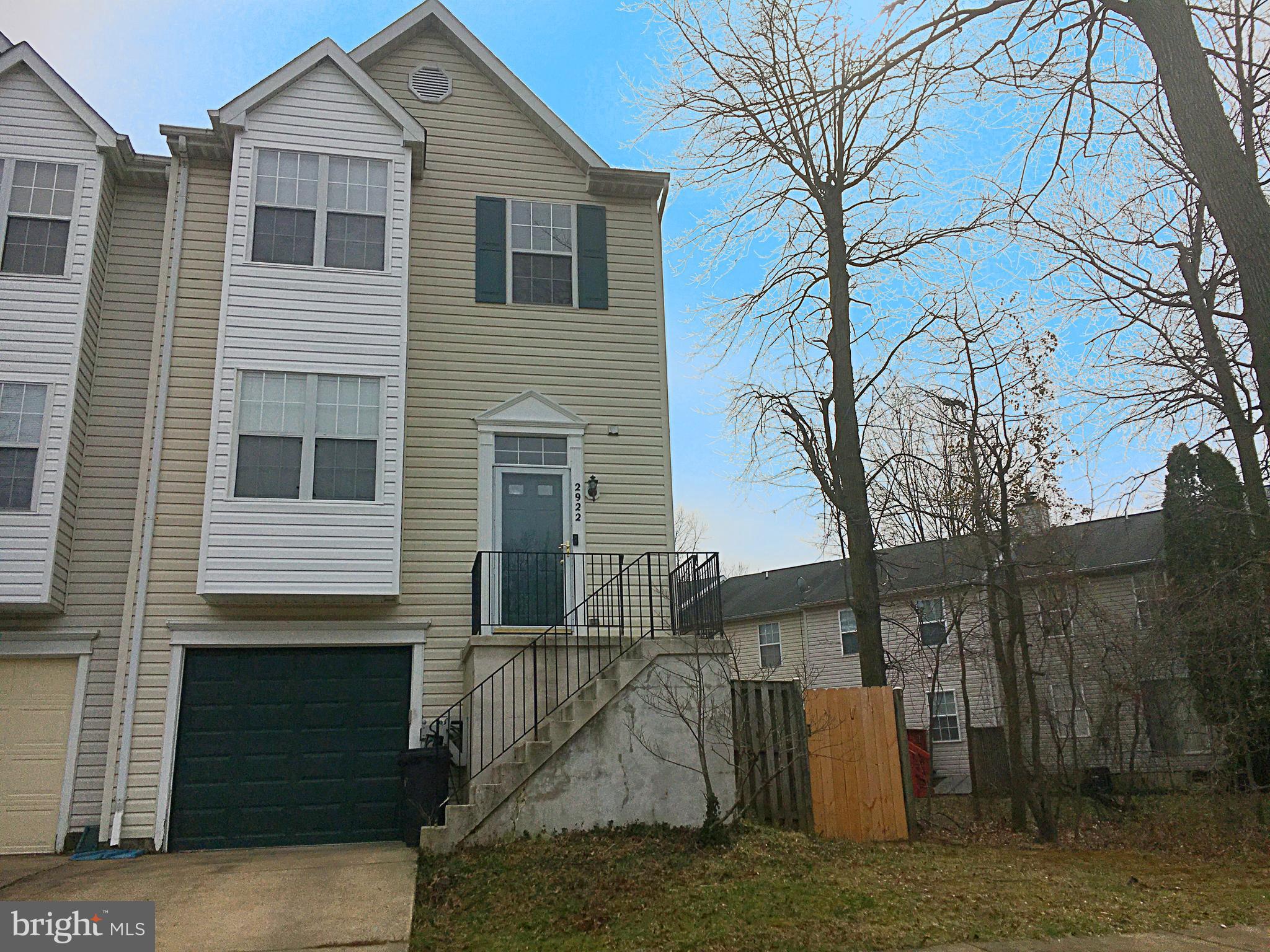 Move-In Ready! This  End Unit Townhome with a garage features three freshly painted levels with hardwood on the main level and carpet upstairs and in the basement living areas. The garage has space for storage and vehicle as well as one parking space in the driveway. Enjoy the deck and and fenced in yard that  wraps nicely around the side of this end-unit.  Metro accessible and very easy access to 495, major roads, DC, VA and nearby military installations makes commuting less worrisome.  It is conveniently located with shopping and amenities in walking distance to top it off. Credit/Income/Rental Hist weighed heavily. Pets case by case basis. App fee $75/person.