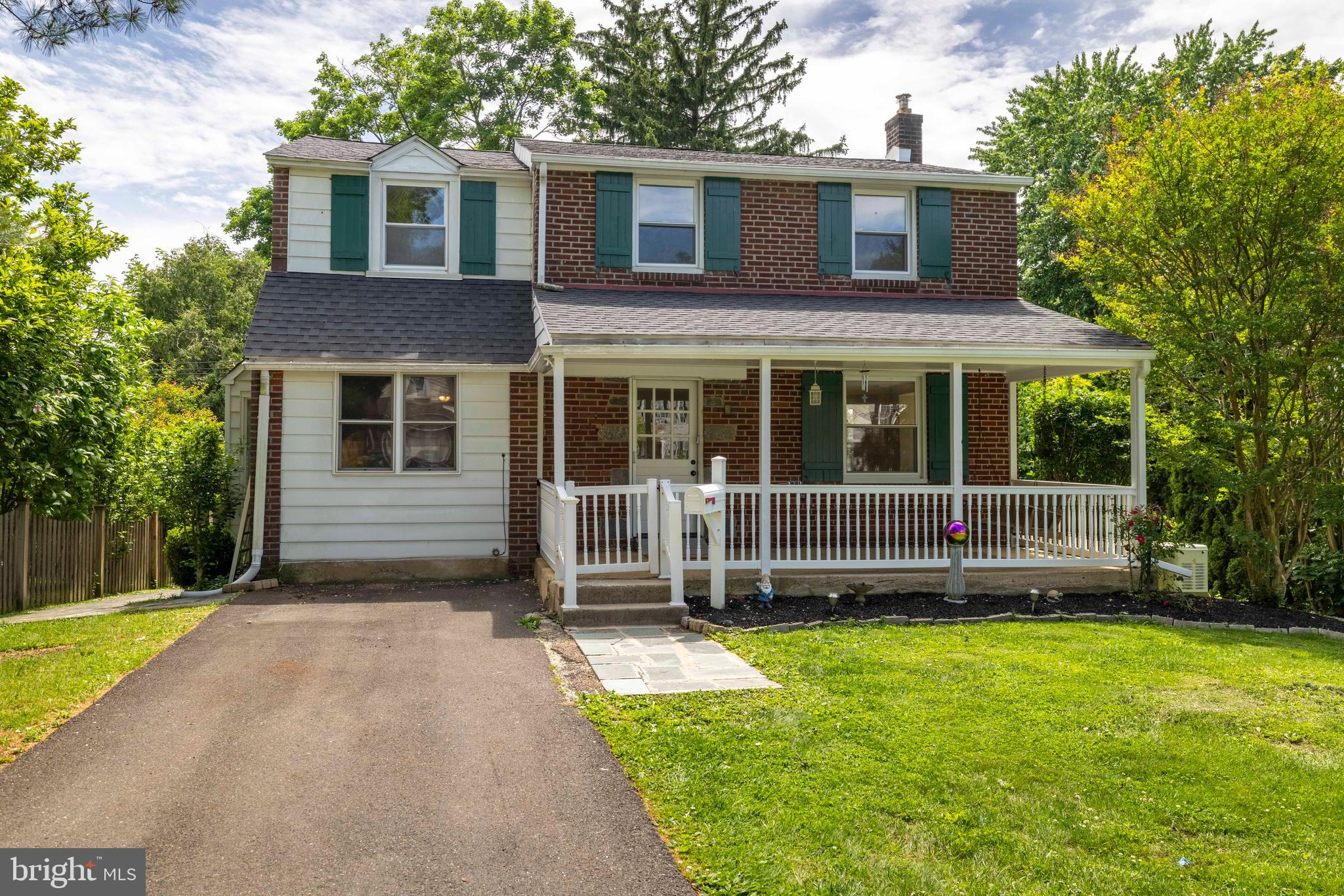 Welcome home to the highly desirable Overlook Hills section of Abington Township! This charming 2-story colonial offers wonderful curb appeal with an inviting open front porch complete with a porch swing — the perfect spot to relax and enjoy the neighborhood setting.

Inside, you’ll find a spacious living room and formal dining room featuring beautiful wood floors that add warmth and character throughout the home. The updated kitchen addition is designed for both everyday living and entertaining, offering an abundance of cabinetry and countertop space, a 2-drawer dishwasher, gas range, built-in microwave, bow window, and room for a table.

Just off the kitchen is a comfortable rear family room highlighted by a cozy wood-burning stove that serves as a wonderful supplemental heat source. Sliding access to the rear deck and backyard creates the perfect flow for indoor and outdoor entertaining. A convenient first-floor bathroom with a walk-in tub adds flexibility and practicality.

The second floor features 3 bedrooms and a hall bathroom, while the full partially finished basement provides additional living space, storage, or recreation possibilities.

Additional highlights include a whole-house Generac backup generator, providing added peace of mind and convenience year-round.

Enjoy all that the Overlook Hills neighborhood has to offer, including a community park, playground, tennis courts, basketball courts, baseball and softball fields, and community house. This is a wonderful opportunity to own a home in one of Abington’s most beloved neighborhoods!