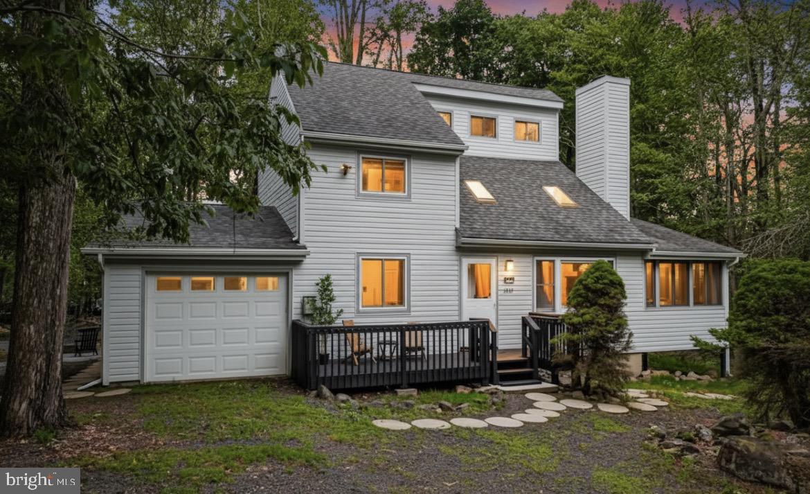***MULTIPLE OFFERS RECEIVED. BEST AND FINAL DUE BY MONDAY, THE 8TH AT 6 PM.***

***OPEN HOUSE: Saturday, June 6th (1 PM–3 PM).  All visitors must pre‑register with the listing agent.***
This GORGEOUS FULLY FURNIISHED 4-bedroom, 2.5-bath contemporary home including a MAIN-LEVEL BEDROOM WITH FULL BATHROOM is a beautifully renovated LAKEVIEW retreat and a thriving SHORT-TERM-RENTAL, with 2025 Airbnb INCOME details available for qualified buyers upon request.
Whether you're seeking a LUXURIOUS personal retreat, a HIGH-PERFORMING INVESTMENT property, or both, this home delivers exceptional VALUE and lifestyle appeal.
Step into this STUNNING, like-NEW contemporary with DESIGNER finishes, and beautiful LAKE VIEWS of Dresser Lake. Located on a quiet CUL-DE-SAC in the STR-friendly, AMENITY-RICH community of A Pocono Country Place, this home delivers the perfect blend of MODERN LUXURY and MOUNTAIN-RETREAT comfort.
Completely RENOVATED top to bottom in 2024 — nothing to do but MOVE IN!
TURN-KEY & fully furnished with stylish, MODERN DECOR.
Open, airy layout with VAULTED CEILINGS and abundant natural light.
ULTRA-MODERN KITCHEN with NEW black STAINLESS-STEEL APPLIANCES, hexagon tile backsplash & WHITE OAK WATERPROOF FLOORING (2024).
Large SUN ROOM/REC ROOMR ideal for ENTERTAINING, lounging, or a SECOND FAMILY ROOM.
BONUS PRIVATE SAUNA for your own IN-HOME SPA experience.
Outdoor entertainment oasis with JACUZZI TUB, firepit, GAZEBO & oversized DECK.
Separate jetted soaking tub room with portrait window — a true spa retreat!
Bedrooms feature acoustic slat wall accents and chic contemporary lighting.
Newer roof & windows ( 2021)
Updated flooring, lighting, fixtures & finishes throughout (2024).

Resort-Style Community Amenities!
A Pocono Country Place offers something for everyone:
2 lakes with beach, kayaking & canoeing
4 pools
3 clubhouses
6 playgrounds
6 basketball courts & 6 tennis courts
Mini golf, community events & 24/7 gated security
Prime Poconos Location
Minutes to skiing, waterparks, hiking, shopping, dining, and all major Pocono attractions.
NEARBY ATTRACTIONS & LANDMARK:
4.3 mi – Tobyhanna State Park
15.8 mi – Mountain Adventures
16.6 mi – Camelbeach Outdoor Waterpark at Camelback Resort
 17.6 mi – Big Pocono State Park
 24.9 mi – Austin T Blakeslee Natural Area
28.2 mi – Jack Frost National Golf Club
 31.9 mi – Stone Meadows Golf Course
36.3 mi – Hickory Run State Park