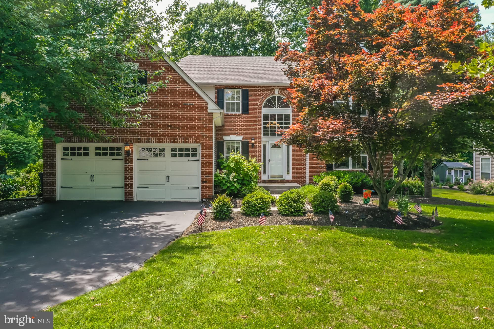 Only an estate sale brings this beauty to the market and it's priced to sell so don't hesitate to book your showing ASAP! This home is within the desirable Garnet Oaks development of the Garnet Valley School District. One of the biggest attractions is the convenience to major roadways, shopping and public transportation plus quality restaurants, parks and much more. In addition, it's close enough to Phila airport and sports, NJ bridges and so much more. As you approach, you'll notice the beautiful brick front making this home a picture of elegance. Enter the front door and find a 2-story Foyer with hardwood floors including inlays which make the borders pop. To your right is a large Living Room with a gas fireplace with marble surround, chair rail and windows with custom coverings. Next to this room is the formal Dining Room which also has cherry hardwood floors and more custom window covers. Next, you'll find an eat-in Kitchen with stainless steel sink and dishwasher and gas stove. This Kitchen has a high breakfast bar that overlooks the large Family Room which has another gas fireplace (brick surround) and more cherry hardwood floors plus a 65" TV which is included. A nicely updated Powder Room and 1st floor Laundry Area complete this level. Just off the Kitchen is a slider that leads to a 2-tier 30’ x 16’ wood Deck that overlooks a very private back yard that backs to a wooded area and a yard that's perfect for entertaining or quiet dinners. Let's go upstairs to find a huge Primary Bedroom with tray ceiling and several closets. The largest walk-in closet has railings and shelves on both sides and leads to another bonus room (combined 22’ x 8’) that could be used as an office or additional closet space. The Primary Bathroom is a beauty with a large soaking tub, separate stall shower and a double-bowl vanity. Three additional bedrooms are very nicely sized to complete this level. One of the bedrooms is currently an office but could easily be converted back to a bedroom . This home also has a partially finished basement has a wall of built-in cabinets behind doors plus a huge unfinished section that houses all the utilities plus tons of built-in shelving and work benches. This home is move-in ready or you can update certain parts but it's priced to sell quickly so you can move in ASAP! Other notable features include replacement windows throughout,  new Central air in 5/25, new gas furnace in Jan 2024 and a new gas water heater in 10/22. Built-in cabinets can be found in the foyer, powder room and office plus shelves in the garage and basement are included. Both gas fireplaces have been recently serviced and ready for use. Please don't wait to schedule your showing anytime on/after 6/18 before it's SOLD!
