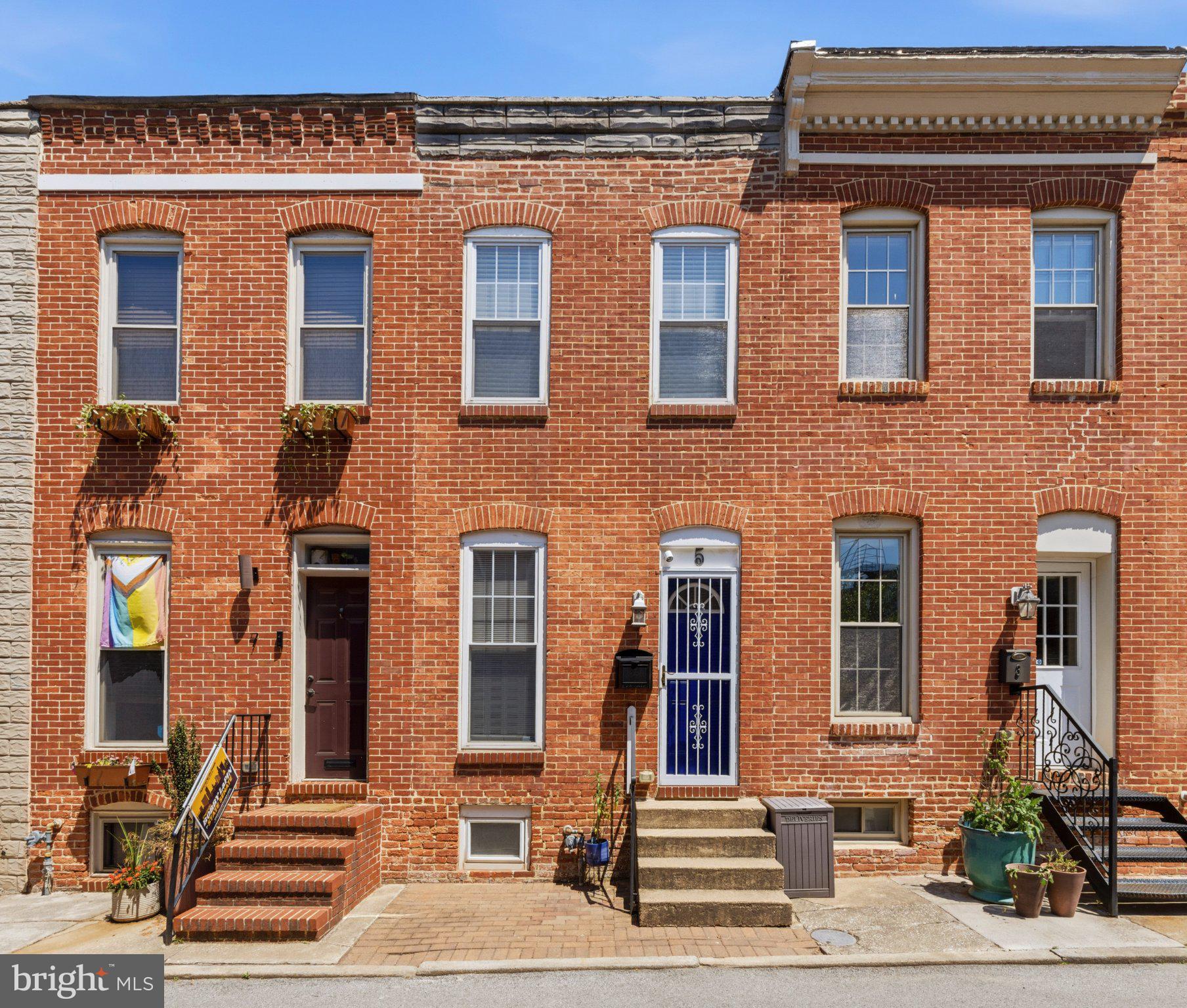 Welcome home to 5 N Bradford.

Nestled on a quiet, one-way street just steps from the lush greenery of Patterson Park, this meticulously maintained home is the quintessential city pad. Packed with thoughtful owner upgrades, this move-in-ready property offers the perfect blend of historic character and modern convenience.

Main Level Living
Step inside to discover a bright and airy main floor featuring hardwood floors and classic exposed brick that perfectly captures that coveted Baltimore charm. The first floor also has dining space, and open kitchen, a convenient half bath and access to your own private parking pad.

Bedrooms & Outdoor Oasis
The upper level features two spacious, above-grade bedrooms, a full bathroom, and access to a second-floor deck. This fantastic outdoor space is an incredible value-add, offering a private spot for morning coffee or evening relaxation.

Lower Level & Bonus Features
Need extra room? The fully finished lower level provides a versatile bonus space—perfect for a home office, gym, or third bedroom—along with a convenient, full-size laundry setup and full bathroom.

Standout Perks:
Off-Street Parking: A massive premium for city living!
Location: Peaceful one-way street, just a stone's throw from the park.
Condition: Turn-key, meticulously cared for, and ready for its next owner.

Everything you need to live your best city life is right here at 5 N Bradford.