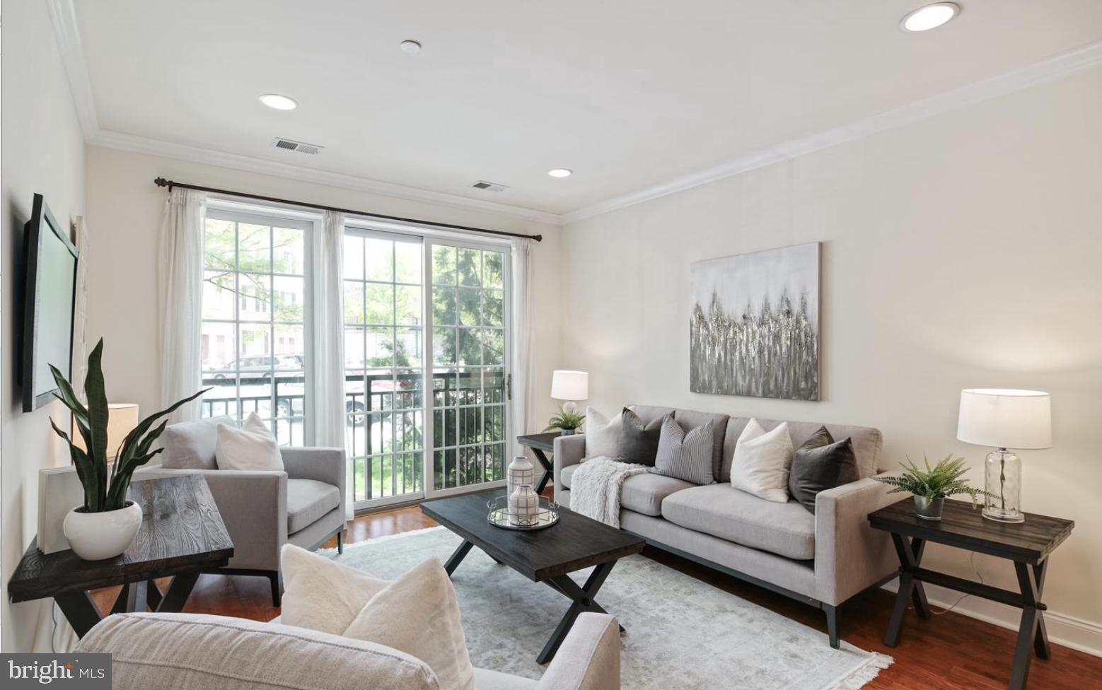 Ideally located in a prized, gated enclave just south of Fitler Square, and only steps to University City, this fantastic 1-bedroom, 1-bath with deeded parking & storage is located in Naval Square- Philadelphia’s premier gated community!  First enter into the spacious chef’s kitchen featuring an island with sleek granite countertops, Whirlpool Gold stainless appliance suite, tumbled marble backsplash, and 42 inch cherry cabinetry + built-in pantry. The spacious open concept living/ dining space offers high ceilings, a Juliet balcony with views of Naval Square's beautiful landscaping, recessed lighting & gleaming oak hardwood floors. Just adjacent to the living room, you will find the primary bedroom and hall bath. The spacious owner’s suite has a triple sliding door that allows the sunlight to stream in. The large walk-in-closet is completely upgraded with built-in California Closets! The hall bath also features granite countertops and a recently updated walk-in shower with beautiful slate & marble tiles. Next to the bathroom you’ll find your very own, in unit, full size stackable LG washer/dryer (2019). Neutral paint graces the entire home and brand new carpet was just installed!  Enjoy a spacious coat closet, also with built-ins close to the entryway. The  parking spot (#413) is just in front of the building and the large storage unit (3x6x9) is just down the stairwell very close to the unit.  Enjoy the ease of having the pool & state-of-the-art fitness center directly across from your building and the concierge close by. The dramatic community room in the Biddle Hall rotunda is perfect to reserve for private parties. Enjoy the outdoor amenities of the 20-acre park-like setting: including picnic areas, well-kept gardens & mature landscaping. With a gated entry and on-site visitor parking, convenience and security are paramount. Very close proximity to South Street Bridge, UPenn (0.7 mi), CHOP, HUP & Drexel, Rittenhouse (0.9 mi) & Fitler Square. Fantastic restaurants and cafes, such as Rival Bros Coffee, Friday Saturday Sunday (James Beard Winner), Illata BYOB, Pub & Kitchen, Southgate, Sabrina's & Loco Pez, are all just steps outside the gates. The new Heirloom Market by Giant and South Square Market are only a block away. Directly out the back gate you will find easy access to the Schuylkill River Park, including the Award Winning Trail & Boardwalk, Markward playground, Tennis Courts & dog park! Naval Square is a pet friendly community allowing up to 2 pets with no weight restrictions. Don't miss this rare opportunity to own a piece of urban paradise in one of Philadelphia's most sought-after neighborhoods! Their is a Special Assessment with approximately 9 months remaining (approximately): $1,706.31 *There is a separate annual tax bill for the parking space. It is $559 Annually for 2025.