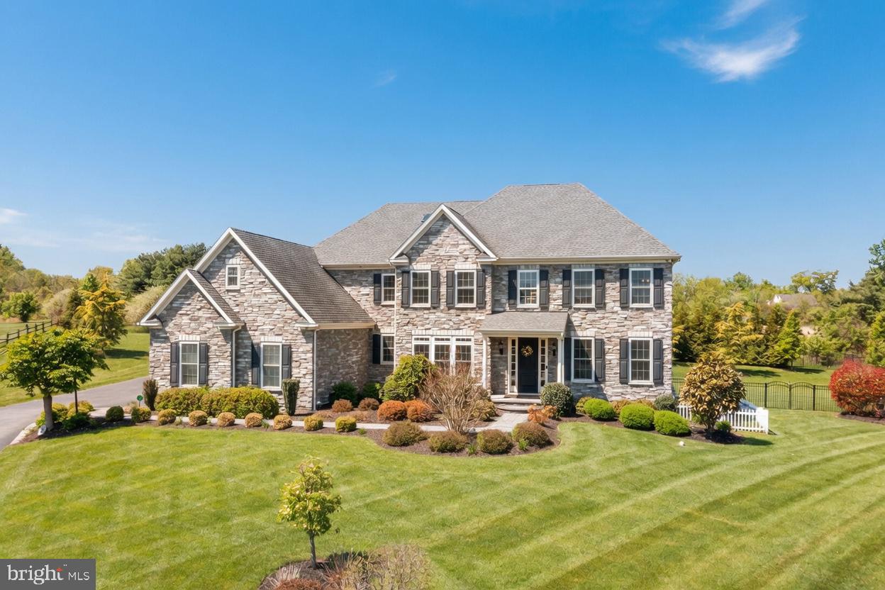 Welcome to this exceptional home  in desirable Worcester Township, located within the highly sought-after Methacton School District. Just 10 years young and offering over 6,300 square feet of beautifully finished living space across three levels.  This home delivers the perfect blend of luxury, functionality, and resort-style living.  The show-stopping backyard is a true private oasis, featuring a magnificent heated saltwater inground pool with integrated spa, surrounded by an expansive entertaining area complete with a built-in firepit, bar, pergola, and an outdoor kitchen with grill and refrigerator. A covered patio with a TV creates the ultimate outdoor living room along beautiful, lush landscaping and a full irrigation system ensure both privacy and ease of maintenance.  Inside, the home impresses with beautiful on site finished hardwood flooring throughout the entire first level, 9-foot ceilings on the first and second floors, and thoughtfully designed living spaces.  An impressive two-story foyer welcomes you, flowing into an elegant, generously sized formal dining room. The main level is designed with versatility in mind, offering seamless in-law suite potential with a flexible room (currently a playroom with closet), an adjacent powder room with full bath conversion potential, and a private office that can easily serve as dedicated living quarters. The gourmet kitchen is centered around a generous sized island featuring stainless steel appliances, gorgeous granite countertops, a beautiful decorative backsplash, extra cabinetry with a wine cooler that flows seamlessly into the main living areas.  Upstairs, the second level offers five spacious bedrooms and four full baths, including a luxurious primary suite featuring a private office or fitness room, two walk-in closets with custom organizers, additional closets, and a spa-inspired bath with double vanity, soaking tub, and oversized shower with dual shower heads. A Jack-and-Jill bath, additional en-suite bath, and a central lounge area enhance the functionality of this level. Wait there's more!  The finished third floor provides even more flexibility with a private bedroom, full bath, skylights, its own HVAC zone, and a large living area—ideal for guests, extended family, or an additional in-law suite.  The finished walk-out basement features additional living space perfect for entertaining and includes a powder room, abundant storage, and direct access to the backyard. Additional highlights include a whole-house generator, multi-zone HVAC (separate zones for first, second, and third floors), whole-house speaker system, some tinted windows, an oversized 3.5-car garage, main level laundry room with cubbies, two sump pumps, and extensive storage throughout.  The location is unbeatable, just minutes from Blue Bell and Skippack for all their great dining options. Commuting is also easy, with the turnpike and route 422 only minutes away.   This is a rare opportunity to own a truly turnkey, luxury home with unmatched indoor-outdoor living in one of the area’s most desirable locations.