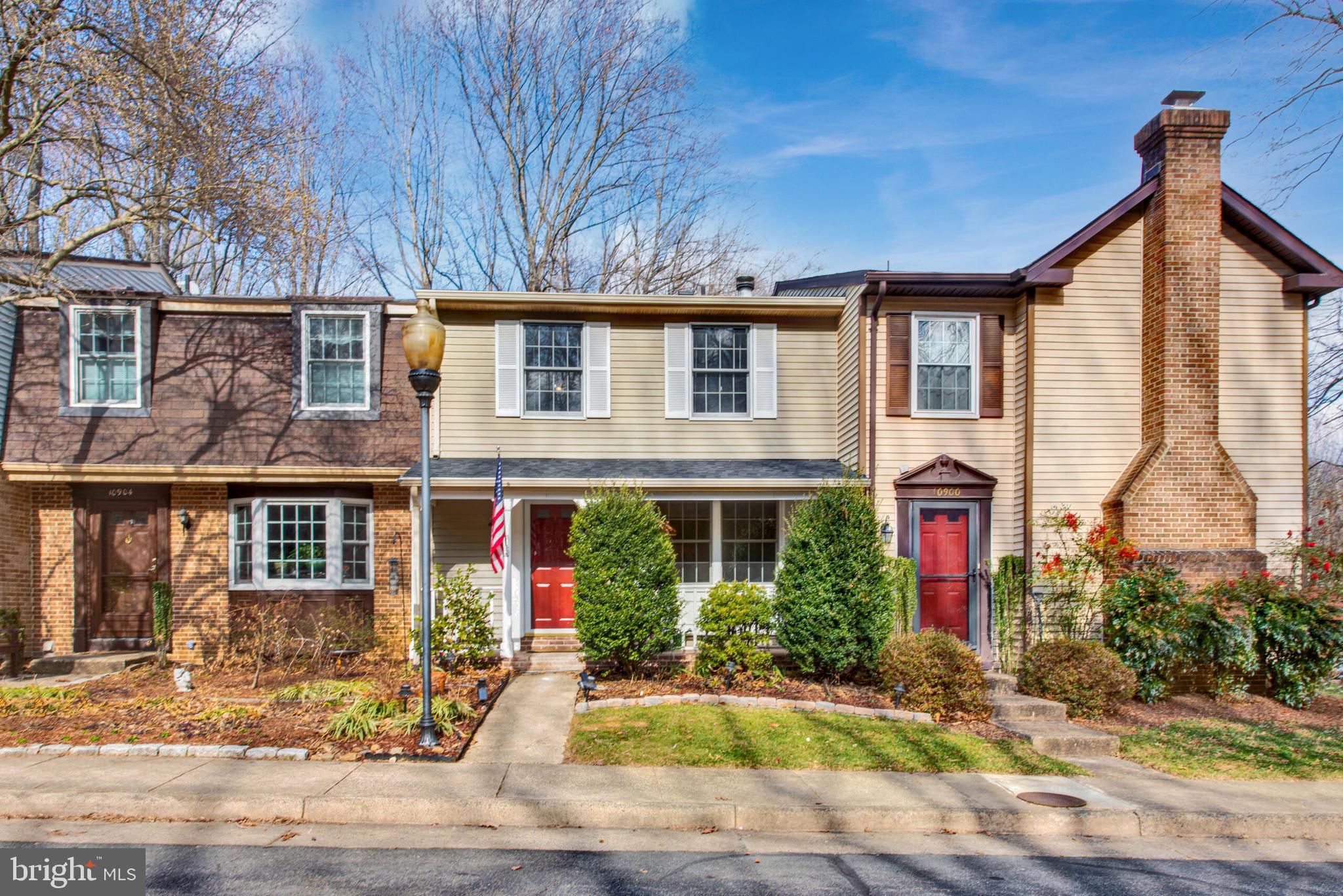 Nestled in a charming enclave with timeless appeal, this beautifully maintained townhome offers the perfect balance of warmth, style, and modern convenience. From the inviting front porch to the serene backyard retreat, every detail has been thoughtfully designed for both comfort and functionality.

Step inside to the warmth of hardwood floors and a neutral palette that sets the stage for an inviting and airy atmosphere. The main level features a spacious living room filled with natural light, while the beautifully updated kitchen boasts cream-toned cabinetry, granite countertops, and a versatile island. Just beyond, the cozy family room with a wood-burning fireplace flows seamlessly into the dining area, where Anderson French doors lead to a private deck overlooking lush common space and mature trees—an ideal setting for morning coffee or alfresco dining.

Upstairs, the spacious primary suite provides a peaceful escape, complete with an updated en-suite bath and generous closet space. Two additional bedrooms, each thoughtfully designed, share a stylishly renovated full bath. Two large linen closets offer ample storage, keeping everything within easy reach.

The lower level presents a fantastic opportunity for guests, extended family, or a private retreat. With a full bath, wet bar, and direct access to a secluded lower-level deck, this flexible space can serve as an in-law suite, home office, or entertainment area. The dedicated storage/utility/laundry room ensures maximum functionality while keeping your home organized.

This home has been meticulously maintained with key updates, including a new roof (2020) and refreshed bathrooms (2016), ensuring peace of mind for years to come.

Location is everything, and this home delivers! Just minutes to the Wiehle Metro station and within walking distance to the W&OD Trail, you’ll have effortless access to Reston’s four lakes, pools, tennis courts, sports courts and fields, miles of trails, picnic areas, and playgrounds. Plus, you're just moments from the vibrant energy of Reston Station and Reston Town Center, where top-tier dining, shopping, and entertainment await. With its prime location in the heart of Reston’s Sunrise Valley school district, this home offers the perfect blend of convenience, community, and modern comfort.

Special Financing Incentives available on this property from SIRVA Mortgage.