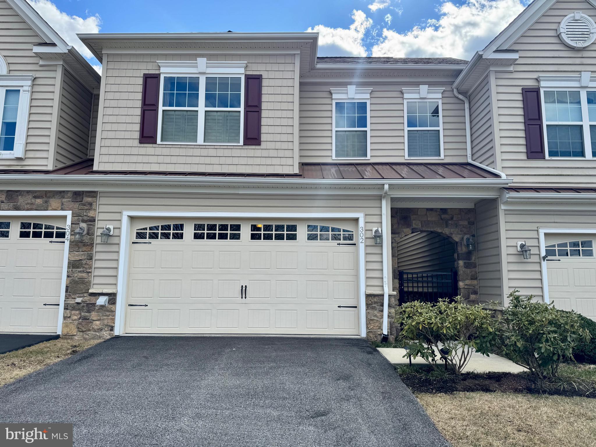 Come discover this pristine 3 Bedroom, 2 Full Bath, 2 Half Bath, 3375sqft Wexford model townhome in the coveted Village of Brandywine. With over $200,000 in addional options and finishes, this former model home is the one you've been waiting for! Enter the home through your own private courtyard and into the foyer with two story vaulted ceiling. The main level contains the homes spacious dining room, eat-in kitchen, great room with fireplace, powder room, and laundry room with access to the attached two car garage, all with hardwood flooring and moldings throughout. Also located on the main floor is the home's primary bedroom, complete with two walk-in closets and large primary en suite bathroom. Located on the home's second story are two additional good sized bedrooms, full bathroom, as well as massive loft space with custom built-ins. As you descend into the home's finished basement, you'll find a tremendous space with recessed lighting, wet bar, additional powder room, office/study, and storage room. While the home was built with upgrades to numerous to list in their entirety, some of the more notable include: upgraded kitchen cabinets and countertops, bathroom fixtures and vanities, windows, stairs and risers, moldings/crown/wainscoting, and many more. When it comes to 302 Cassell Ct, seeing is believing. Schedule your showing today!