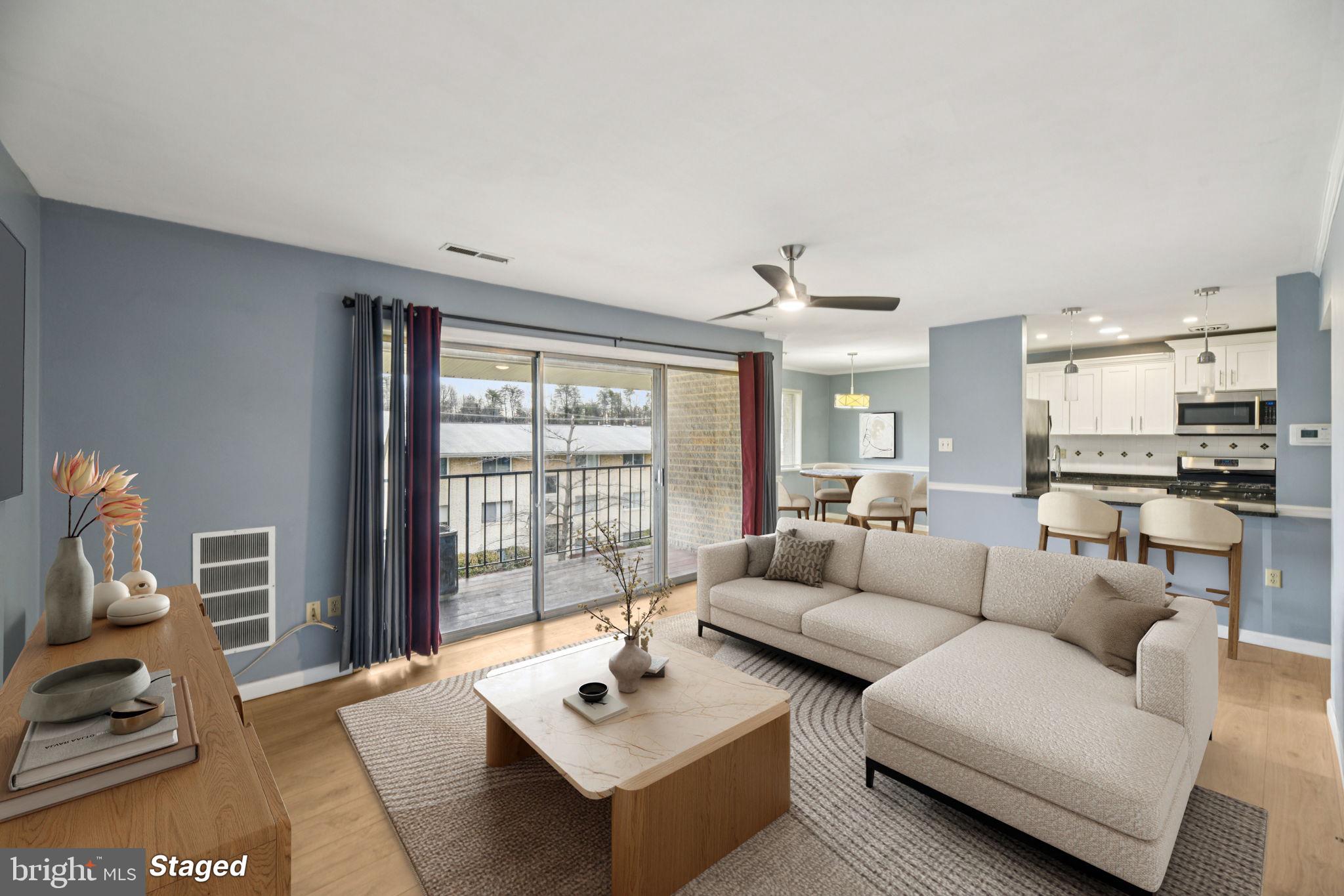 Welcome to this sun-filled, fully updated & spacious two-bedroom, one full bathroom condo with an incredible location! This quiet, 2nd level, top floor condo has an expansive living room with excellent natural light and sliding glass walkout to the balcony. Adjoining the living room are the kitchen and dining room.  The open & updated kitchen features granite counters, gorgeous white cabinetry, stainless steel appliances, recessed lighting, ceramic tile floor and gas cooking.  The separate dining room has great natural light as well.  Both bedrooms have good sized closets, ceiling fans and the full bath is completely updated.  Enjoy the spacious landscaped common areas and playground as well as the outdoor pool at the Carrollan Gardens Condominium, a pet friendly community. With incredible access to public transportation, this home is just a half mile to the New Carrollton Metro Rail, Amtrak, Marc train stops and a Metro Bus stop is right at the community entrance. This home offers a convenient and central location near shopping, the West Lanham Hills neighborhood park, and the Lanham Forest Recreation Center, all just minutes from I-495.

This property qualifies for the $5,000 Chase Homebuyer Grant, which means eligible customers who buy this property and finance their loan with Chase can receive $5,000.
