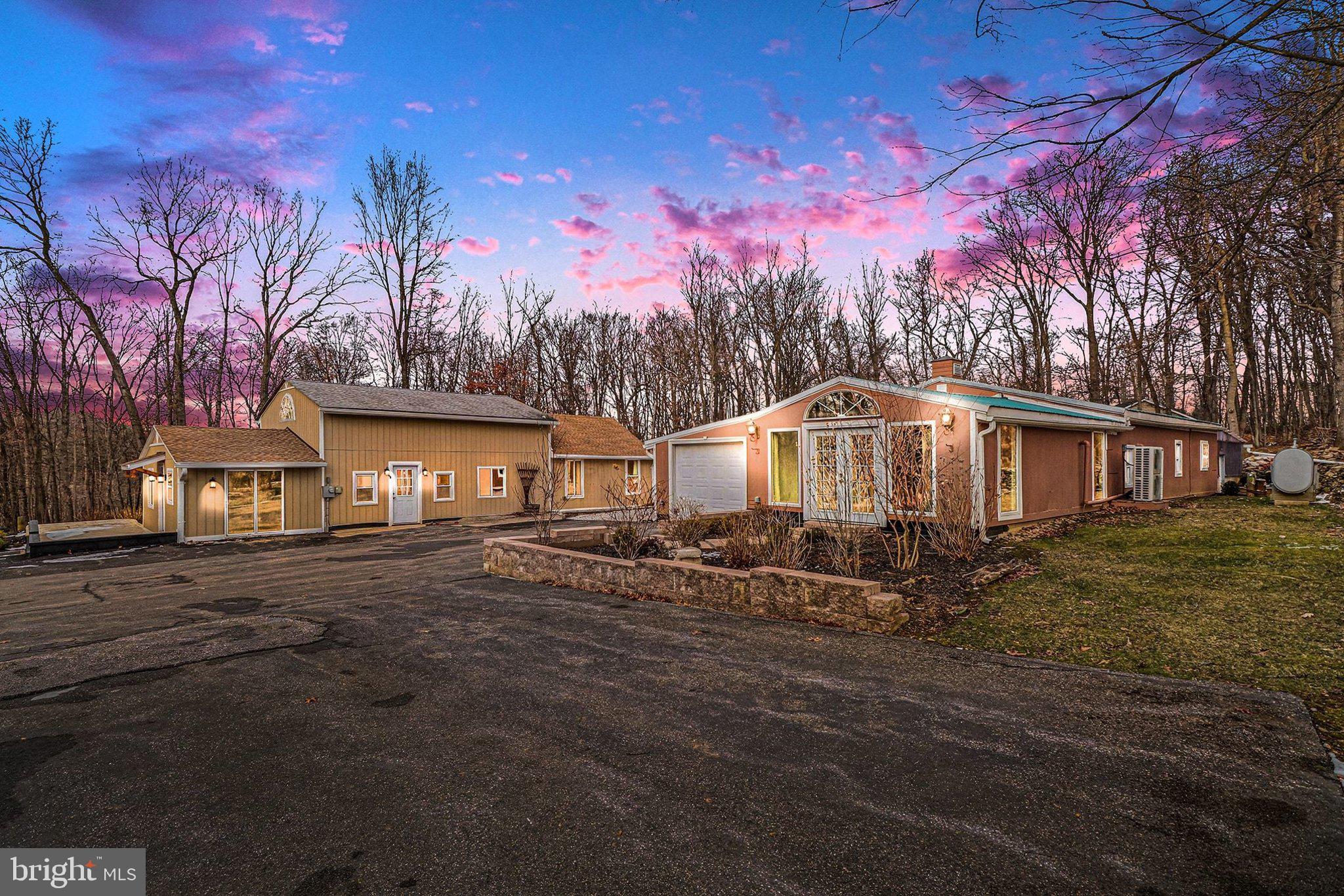 Privacy? Check
Renovated? Check
In-Law Quarters? Check

Welcome to a truly unique property that offers space, versatility, and exceptional features, and all set on just under 4 acres. The beautifully renovated main home features 3 bedrooms, 2 full bathrooms, an updated interior, and a comfortable layout designed for modern living.

The oversized detached two-car garage is far more than a place to park. It includes large bays, generous workspace, and full in-law quarters. The ideal place for extended family, guests, a private office, or additional living space.

With nearly four acres of land, this property provides plenty of room to spread out, entertain, pursue hobbies, or simply enjoy the privacy of your surroundings. Fully renovated and packed with possibilities, this one-of-a-kind property offers the space and flexibility that are increasingly hard to find.

Professional photos will be uploaded on July 17