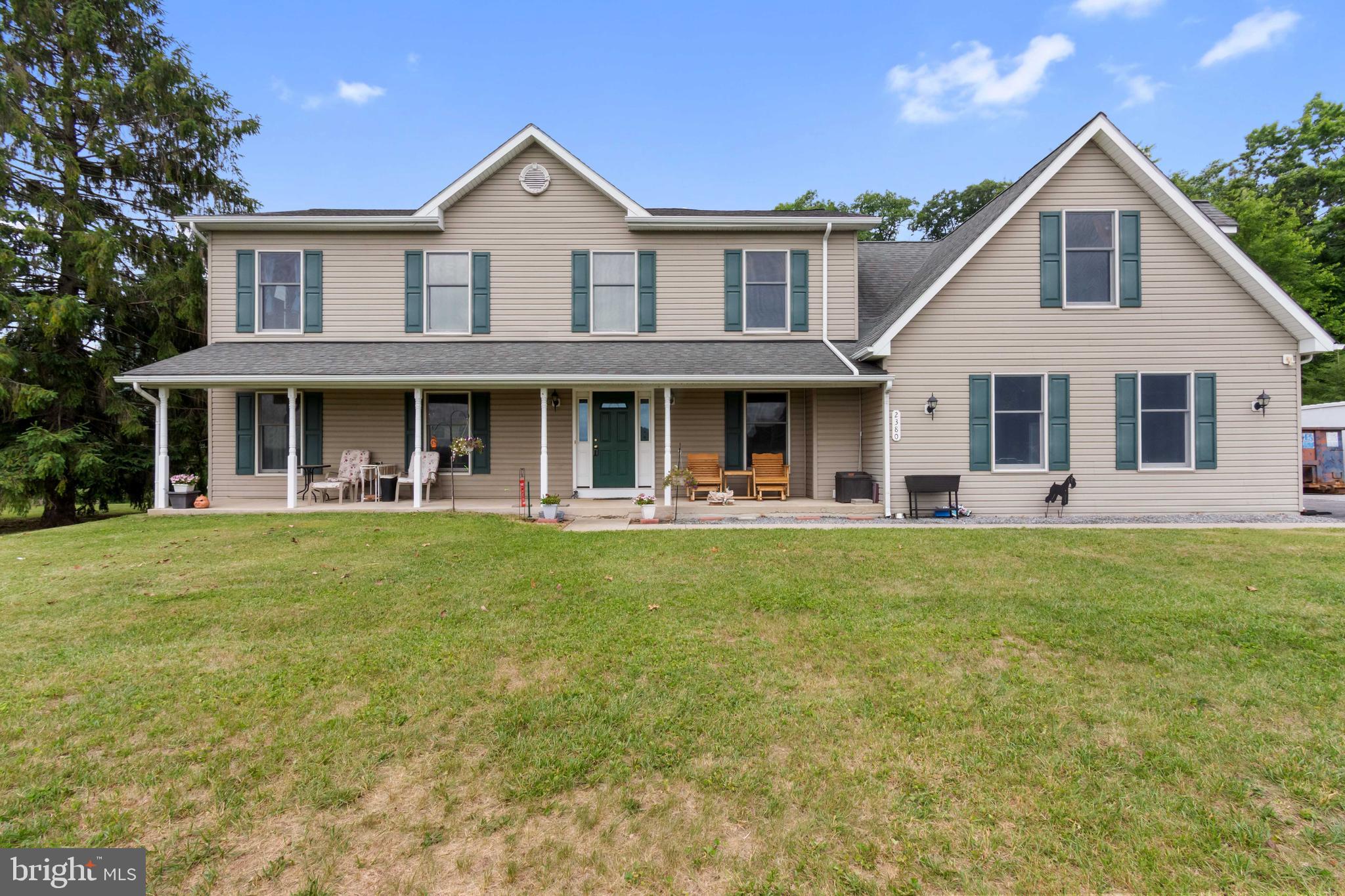Welcome to 2380 Moreau Drive near Westminster – a spacious Colonial perfectly set on 1.44 scenic acres offering privacy, versatility, and beautiful views. This 4-bedroom, 3-bathroom home provides plenty of room to spread out, including a main-level bedroom ideal for guests, multi-generational living, or a convenient home office. The traditional Colonial layout offers comfortable living spaces while still allowing flexibility with multiple bonus rooms that could easily serve as additional bedrooms, offices, craft rooms, or hobby spaces. The primary suite features a spacious private bathroom, creating a relaxing retreat at the end of the day. Step outside to enjoy the peaceful setting from the front porch with scenic views or unwind on the rear deck overlooking the wooded backyard, perfect for entertaining or simply enjoying nature. Additional highlights include a 3-car garage, multiple sheds for storage, hobbies, or workshop space, an energy-efficient geothermal heating system  and whole house generator. The full unfinished basement offers endless potential for future living space, storage, or recreation. Peacefully surrounded by nature yet conveniently located near Westminster amenities, this property offers space, privacy, and opportunity.