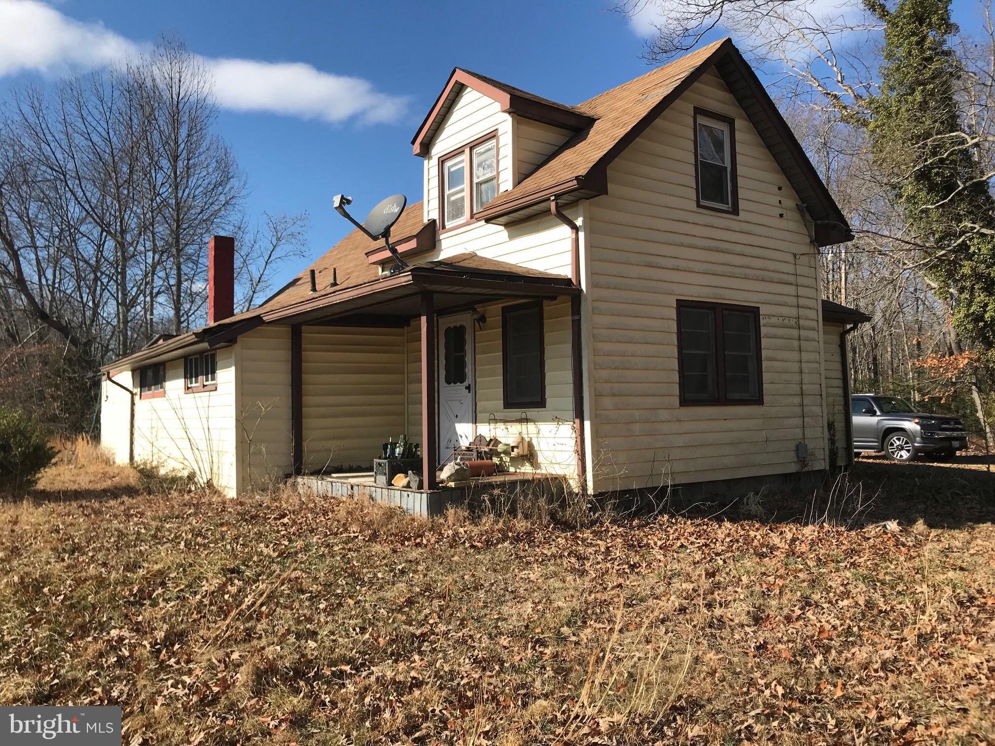 Almost 10 Acres.  Great Potential.  Value is in the Land.  Current home is uninhabitable and seller requests no one enter.  A little TLC could make this property sparkle again.  Cash or Rehab Loans only.  Sold AS-IS