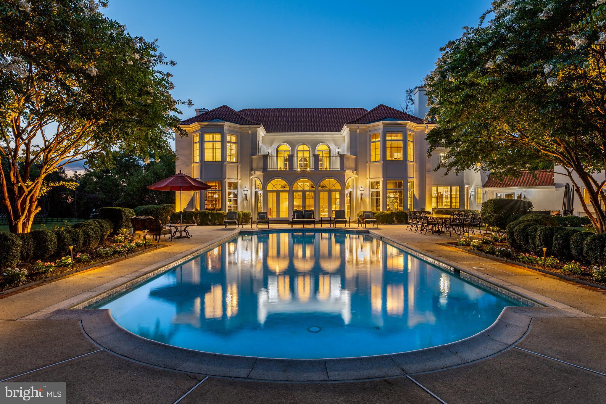 Welcome to 1120 Bryn Tyddyn Drive, a stunning 6+ Bedroom, 5 Full Bath, 2 Half Bath home that perfectly blends Mediterranean style and Beaux-Arts sophistication with modern opulence and traditional comfort. Offering over 9,000 square feet of luxurious living space, this private estate nestled on 2.79 acres of lush grounds with mature landscaping, makes a grand first impression as you enter up the long circular drive w/center fountain. Enter into the 2 story foyer with marble floor, two closets, powder room, and an elegant dual staircase w/custom iron railings & peek through window to the sunroom below. Step down into the formal Living Room featuring a fireplace w/ intricate wood mantle and an abundance of natural light. Step up through the detailed archway into the billiards room with handsome wood paneled walls and built-in bookshelves. Across the foyer is the formal dining room with floor to ceiling windows, papered ceiling, and baroque crown molding, creating a dramatic and elegant space to host dinner parties. A comfortable family room with plenty of space to gather, offers a striking marble fireplace, french doors leading to the sunroom, and a large bay window with views of the back yard. The gourmet eat-in Kitchen with access to a stone patio w/built-in BBQ, boasts marble countertops & backsplash, butler’s pantry, and top of the line appliances including an 8-burner double oven Viking range and a paneled sub zero refrigerator. Head up the main staircase to find the primary suite with its own private terrace, double walk-in closets, and full bath ensuite with stall shower, soaking tub, and an extensive double vanity. Across the landing, there are currently 4 additional bedrooms with ample closet space and 2 full baths (1 ensuite and 1 w/ bedroom & hall access). An incredible media room that could easily be used as a spacious 6th bedroom completes the second level. The expansive addition includes a powder room, wet bar w/ wine storage, built-in desk, drop zone w/ storage, and a 2nd-story office w/ sitting area, wet bar, Juliette balcony, gas fireplace, & full bath. The finished basement provides an open sitting area, full bath w/ stall shower, as well as an additional private room that could be used as a 7th bedroom. Head out back to your own private oasis featuring a gorgeous in-ground pool, patio, firepit, and plenty of space to relax and entertain. Finally, a second driveway leads to the original 3 bay garage with an electric car charger, extra refrigerator, and double oven as well as the 4th garage with storage/workshop space. This meticulously cared for home with a lifetime roof has had considerable updates including 100 % new exterior w/ 15 yr warranty, all new Pella windows & doors, 5 zone HVAC, new gutters, irrigation system, and backup generator. Located in the award-winning Lower Merion school district and close to the Philadelphia Country Club, you’ll want to come experience everything this gorgeous home has to offer.